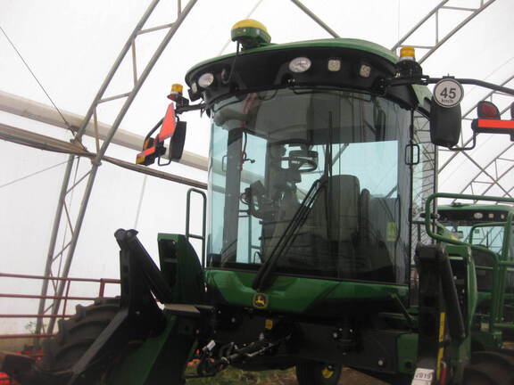Used 2019 John Deere W170 Windrowers at Horizon Ag & Turf in Falher, AB - Photo2