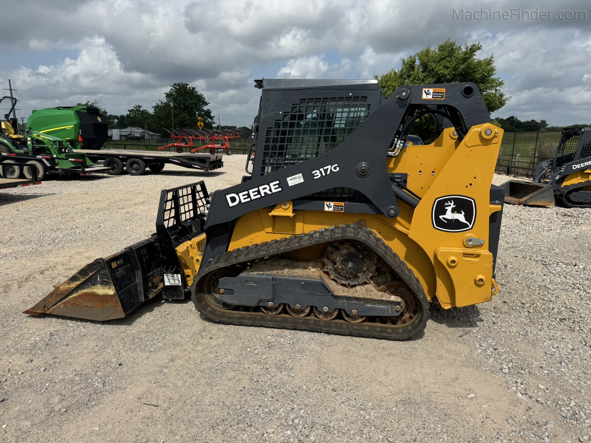 2024 John Deere 317G Image 1