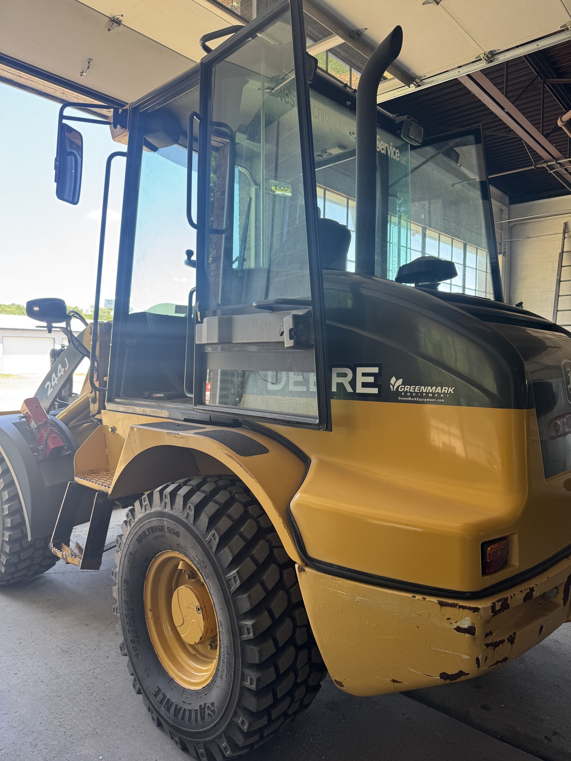 2012 John Deere 244J Image 6