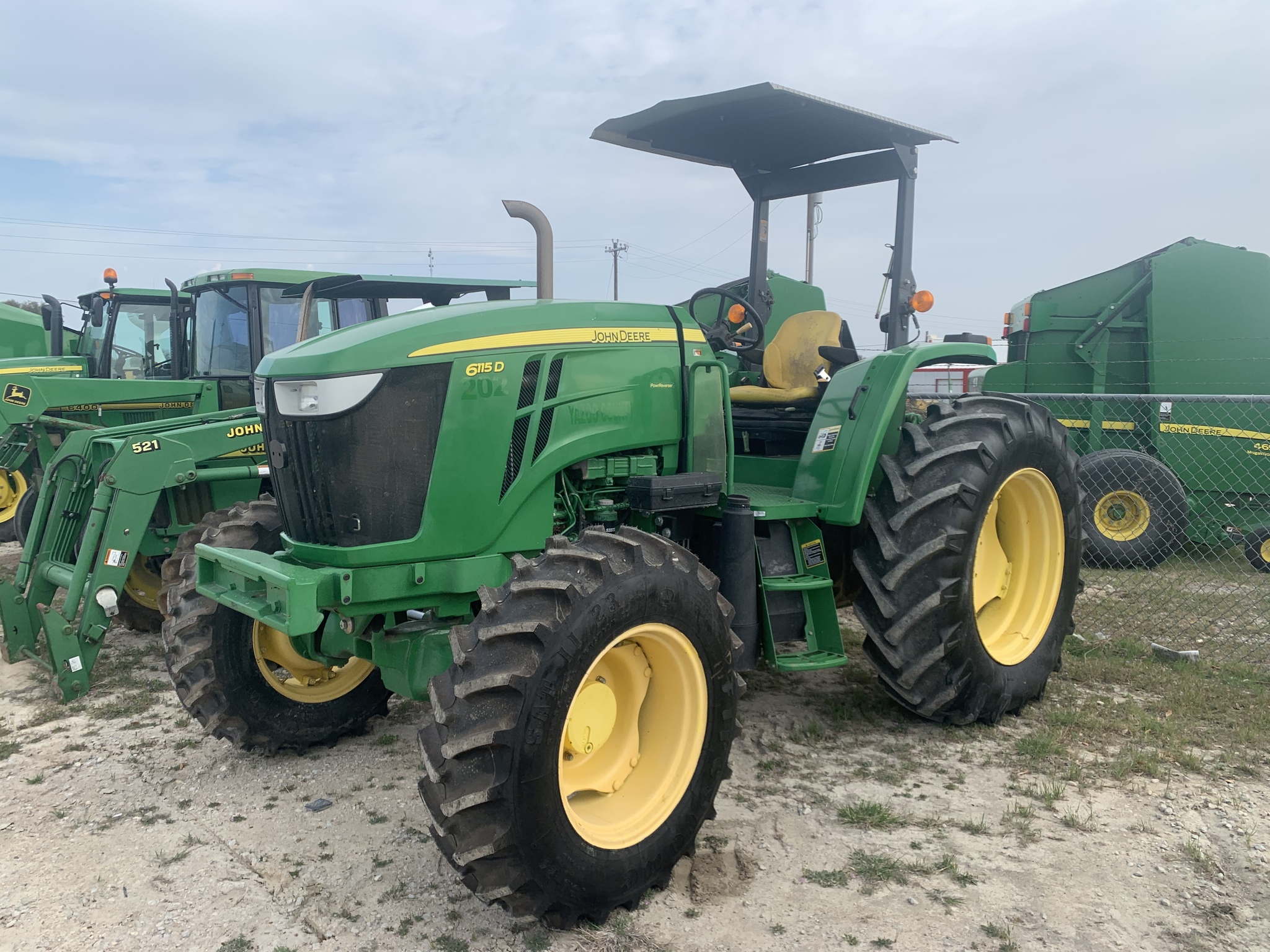 2014 John Deere 6115D Image 1