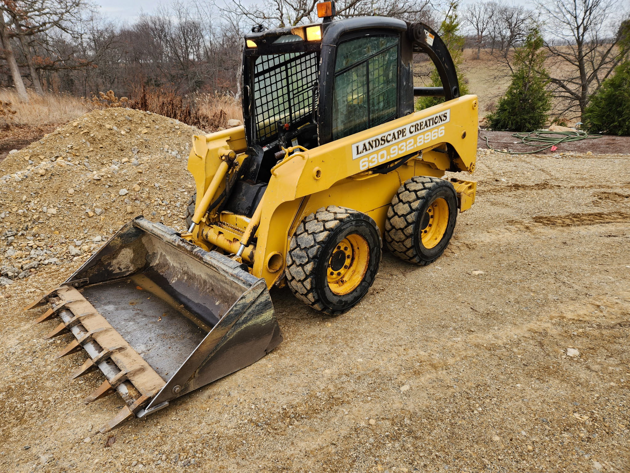 2003 John Deere 240-II Image 1