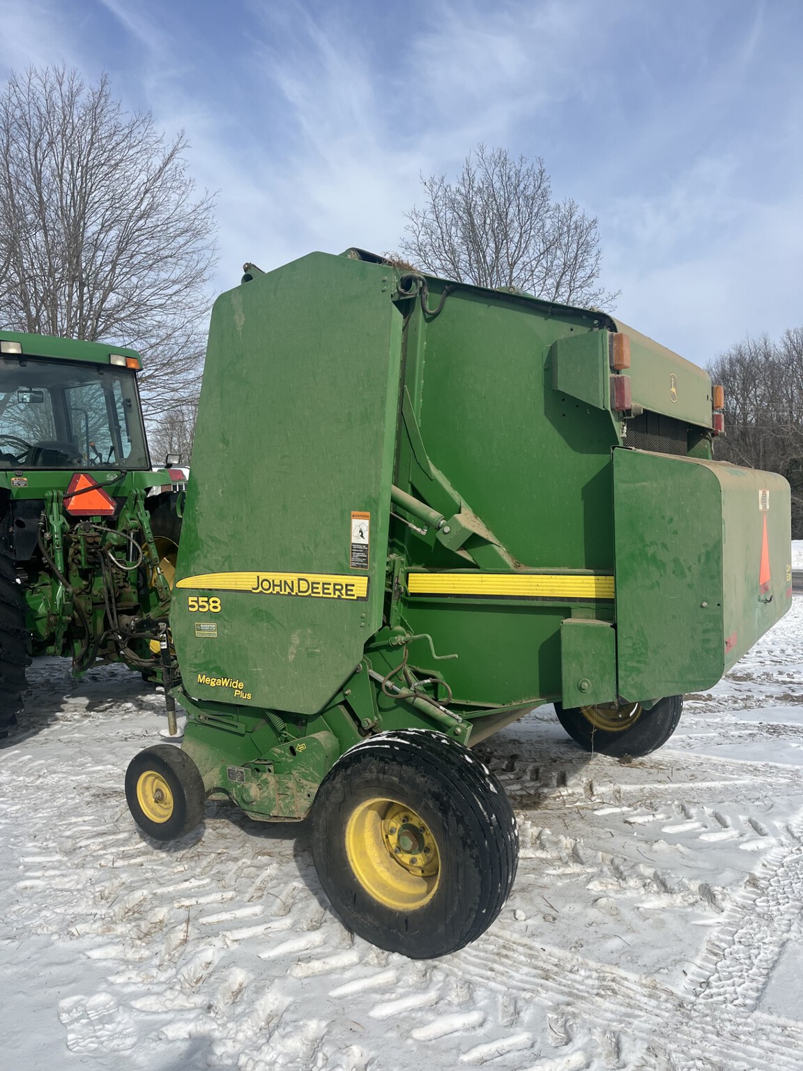 2011 John Deere 558 Image 6