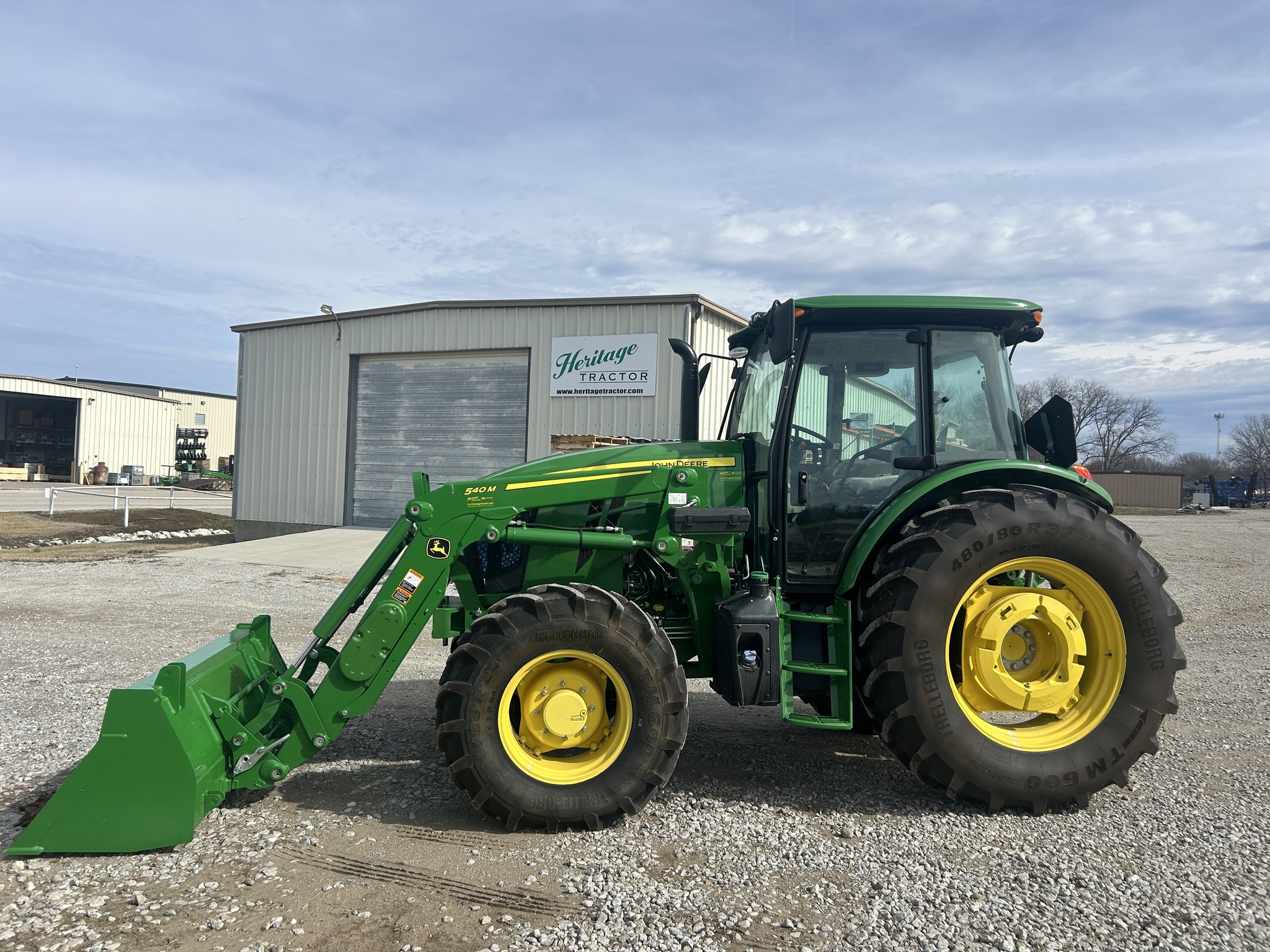  2023 John Deere 6105E at Heritage Tractor in Clinton, MO