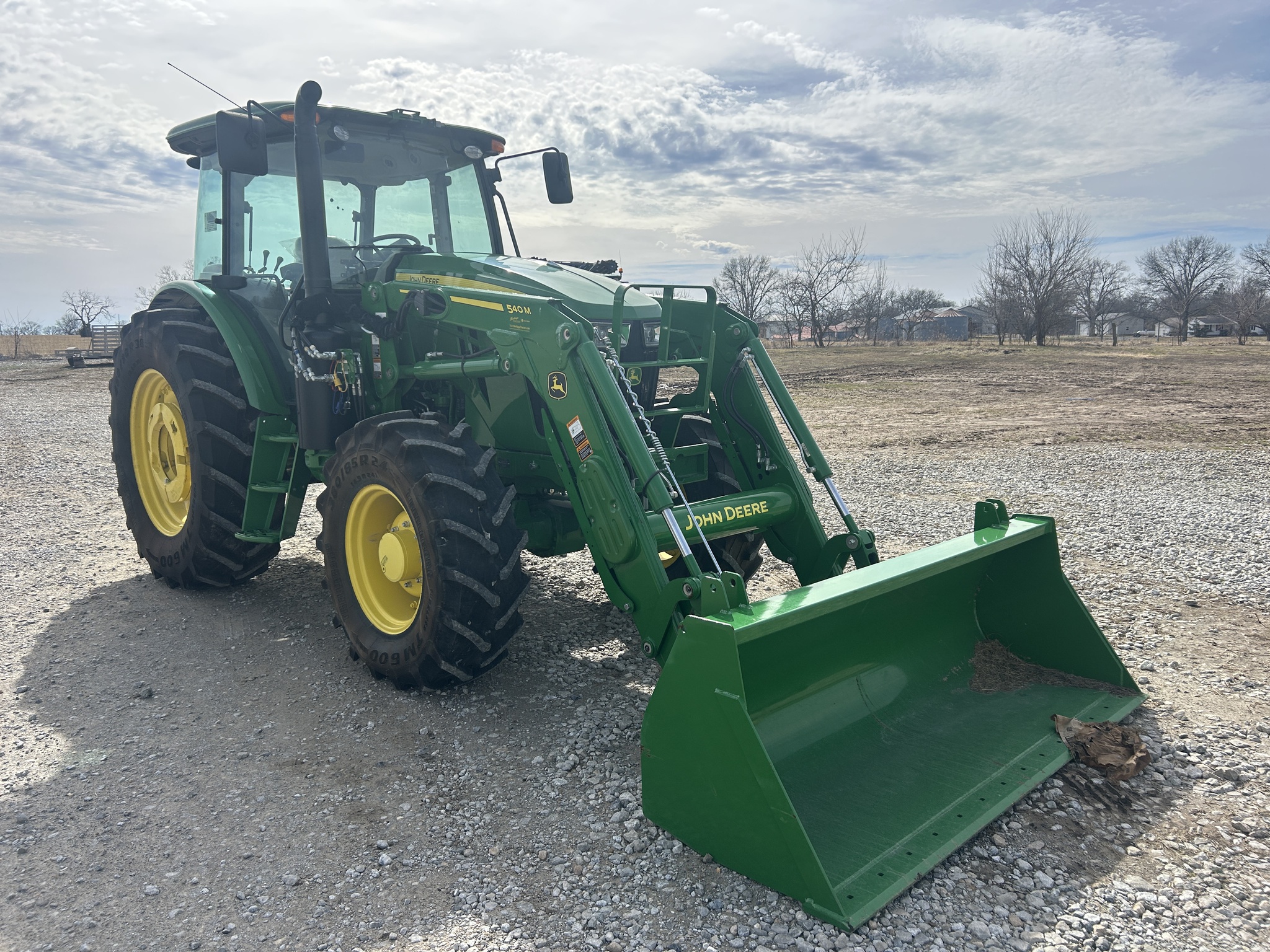  2023 John Deere 6105E at Heritage Tractor in Clinton, MO