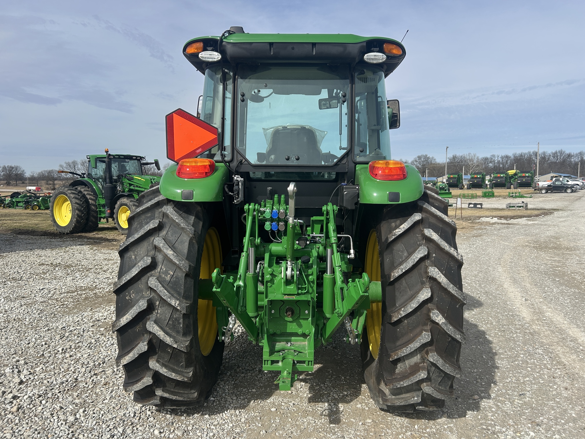  2023 John Deere 6105E at Heritage Tractor in Clinton, MO