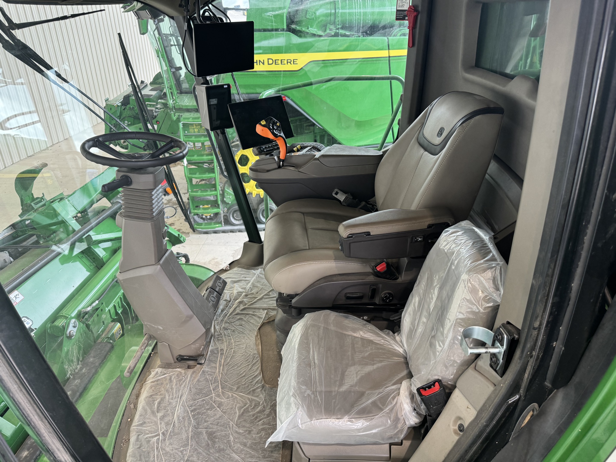  2025 John Deere X9 1000 at Heritage Tractor in Pittsburg, KS