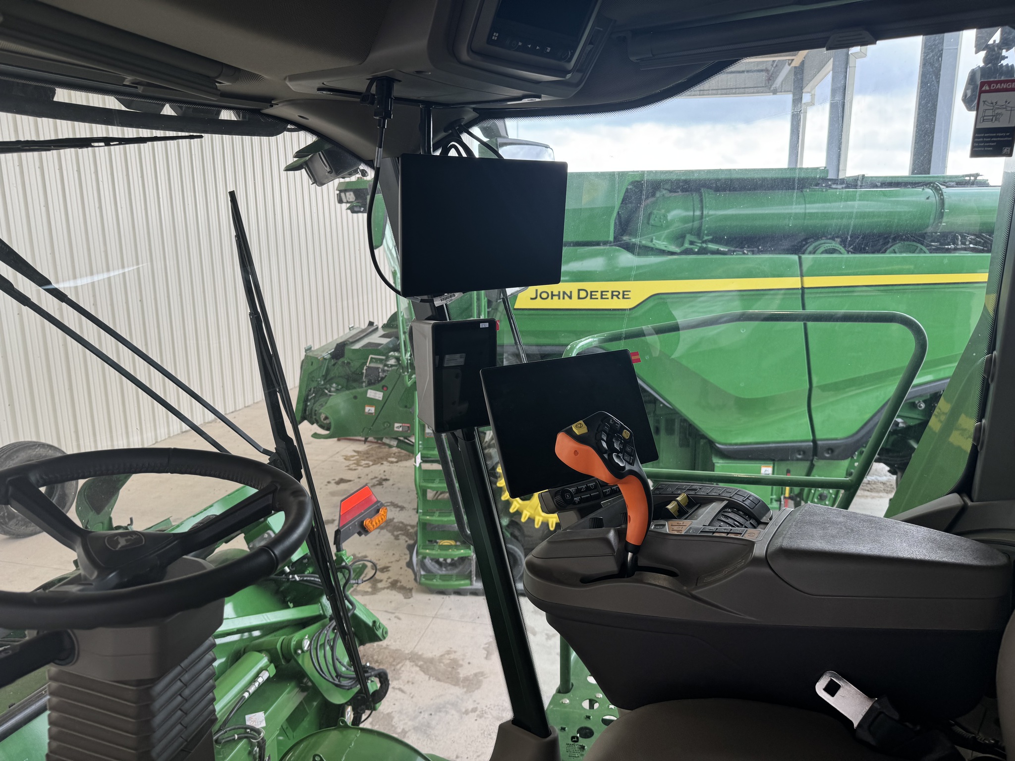  2025 John Deere X9 1000 at Heritage Tractor in Pittsburg, KS