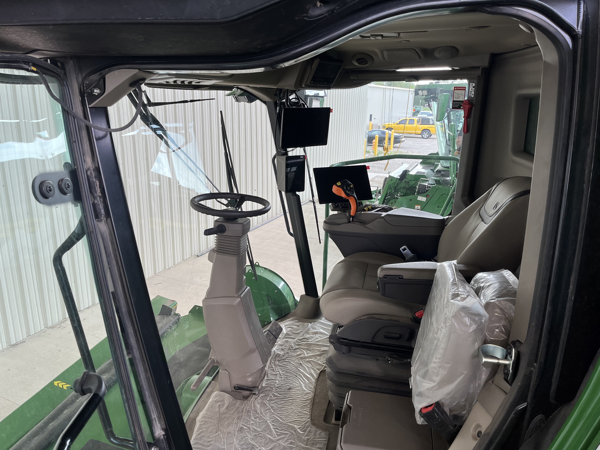  2025 John Deere X9 1000 at Heritage Tractor in Pittsburg, KS