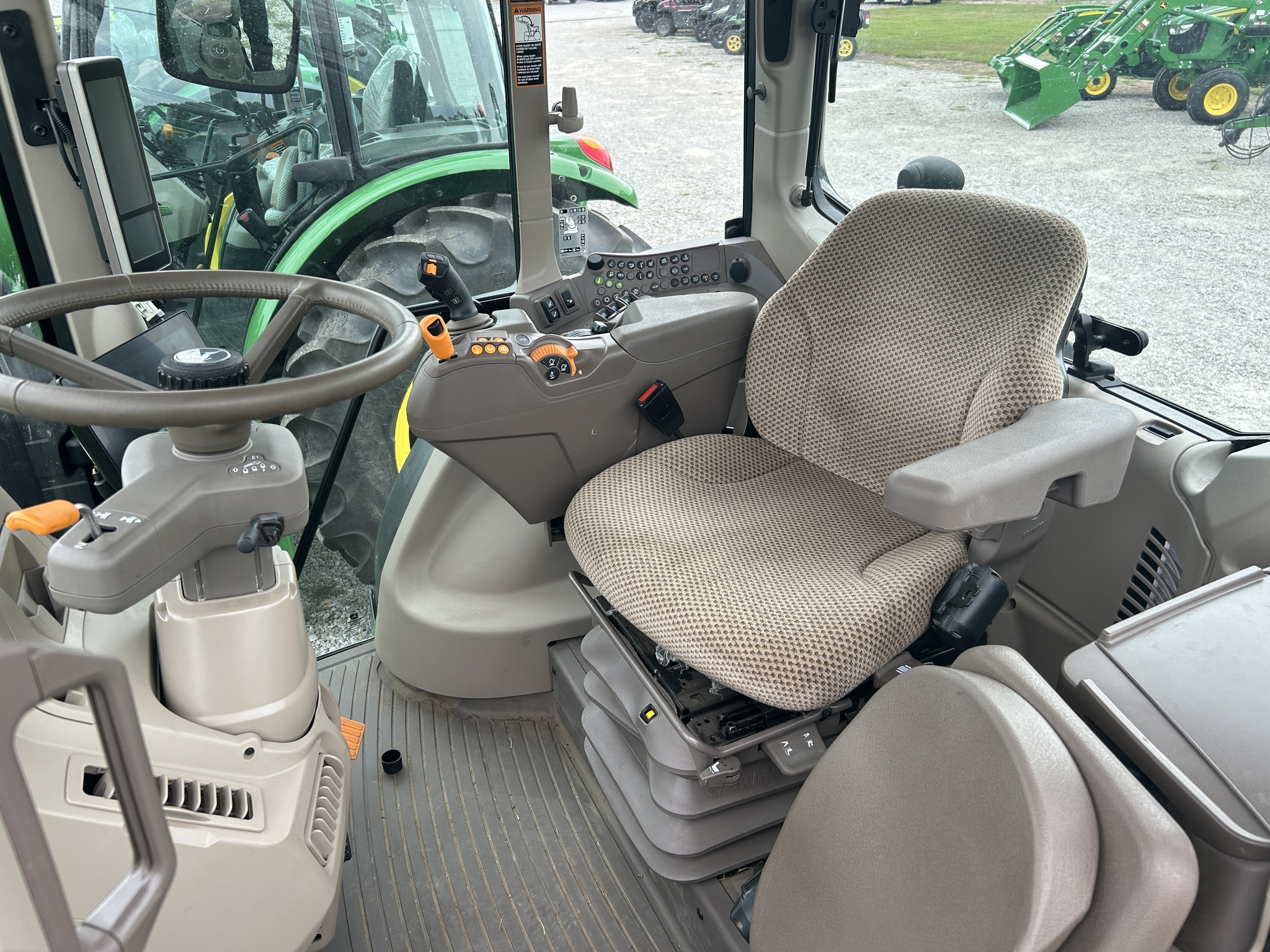  2024 John Deere 6120M at Heritage Tractor in Clinton, MO