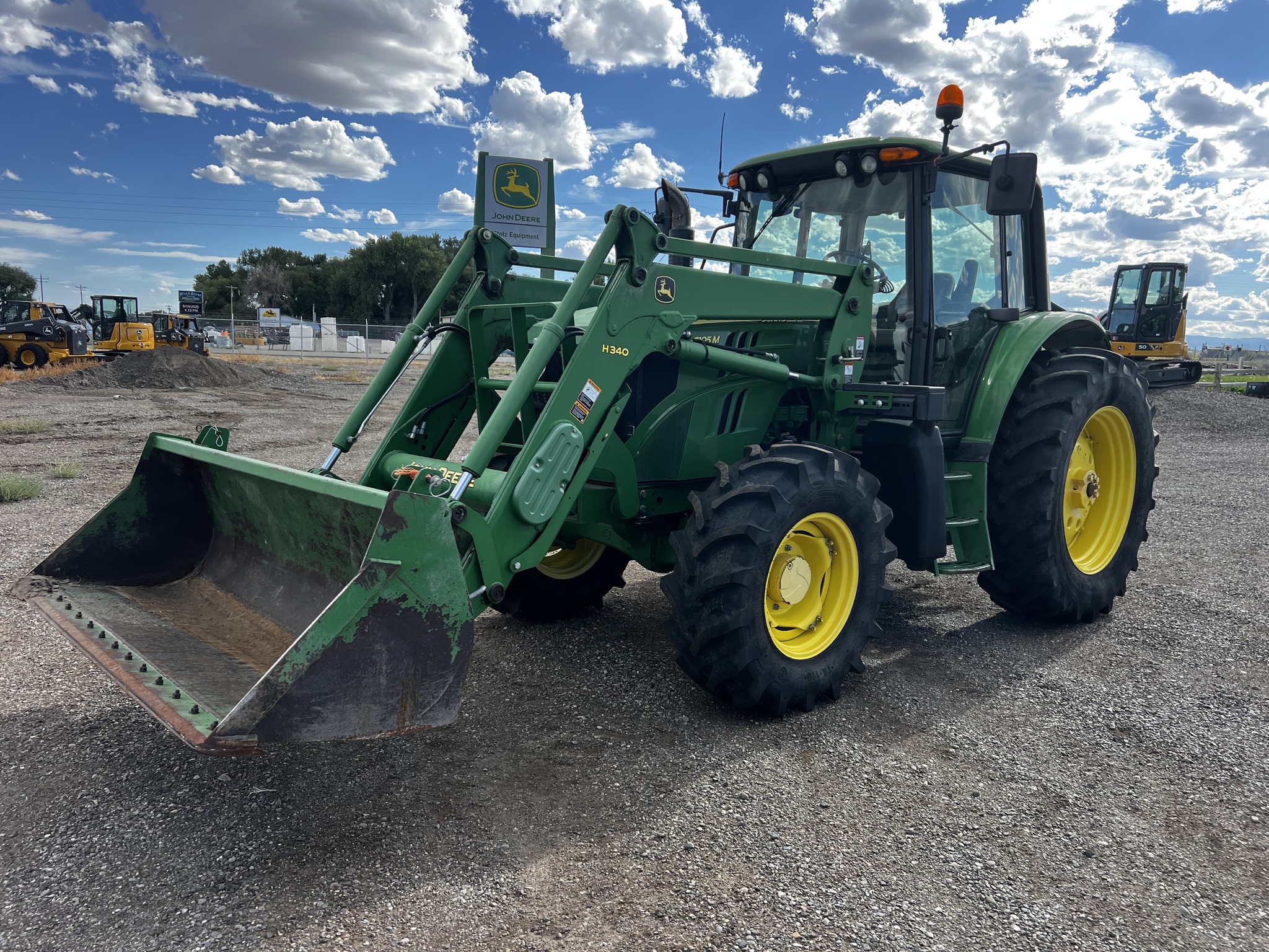 2014 John Deere 6105M Image 1