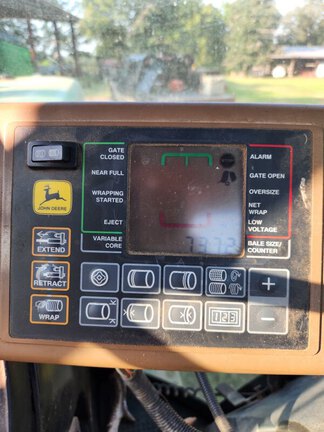 2002 John Deere 557 Photo 7