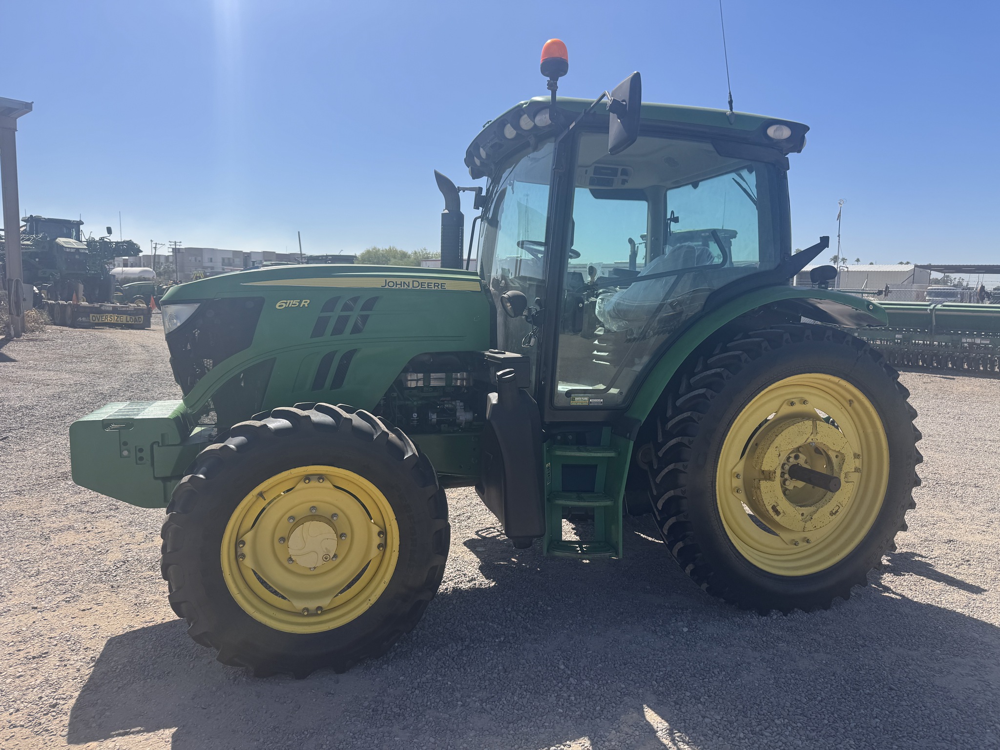 2015 John Deere 6115R Image 1
