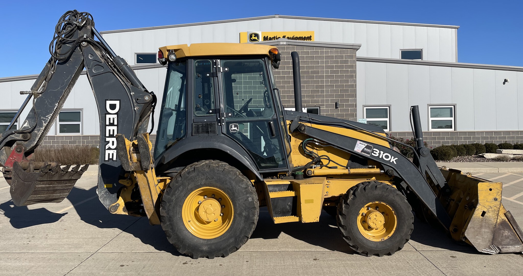 2014 John Deere 310K Image 1