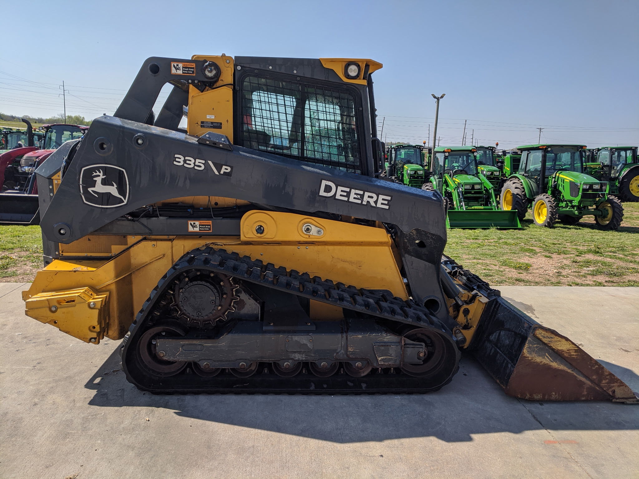  2025 John Deere 335 P at Heritage Tractor in Rogersville, MO