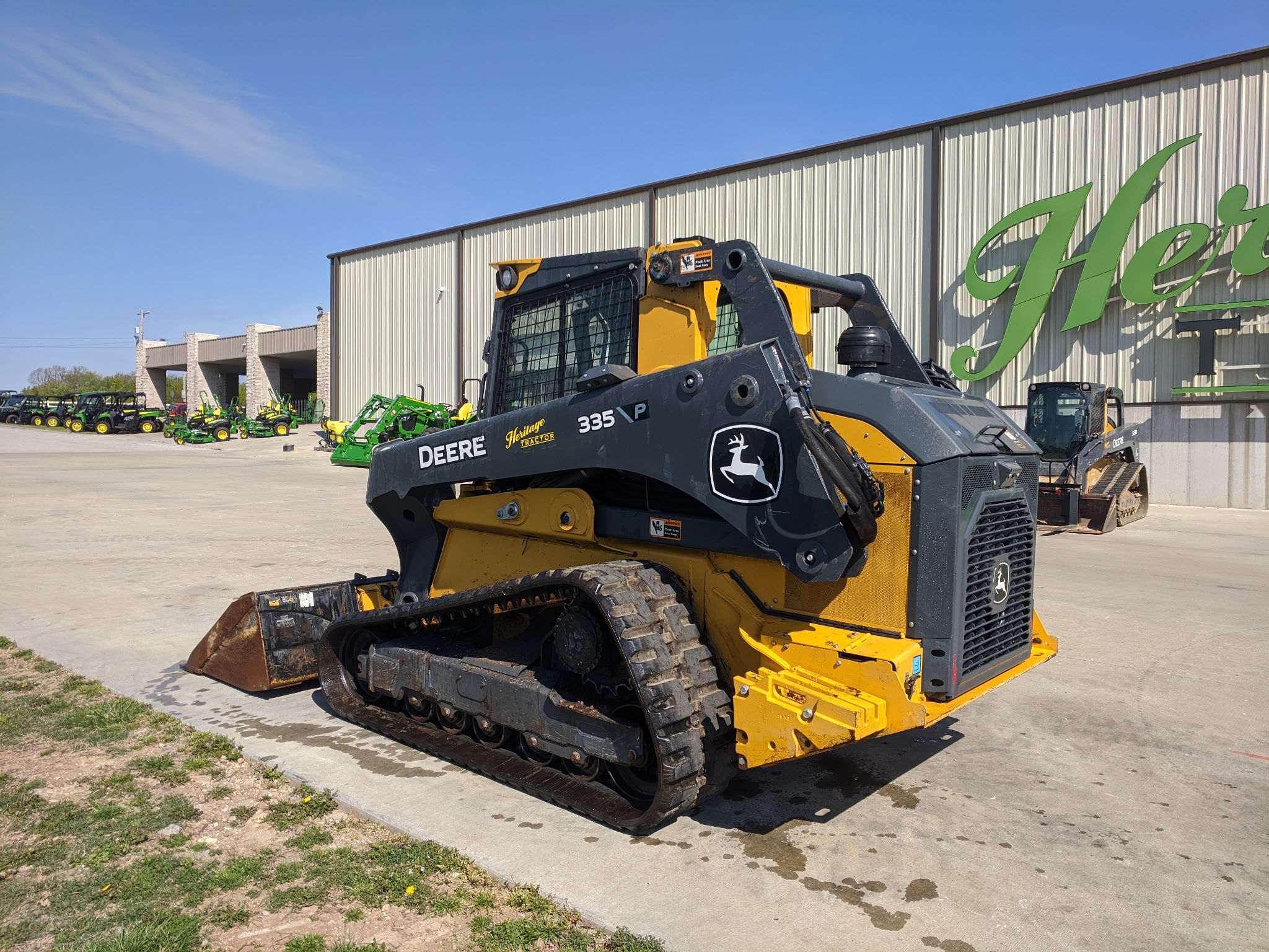  2025 John Deere 335 P at Heritage Tractor in Rogersville, MO
