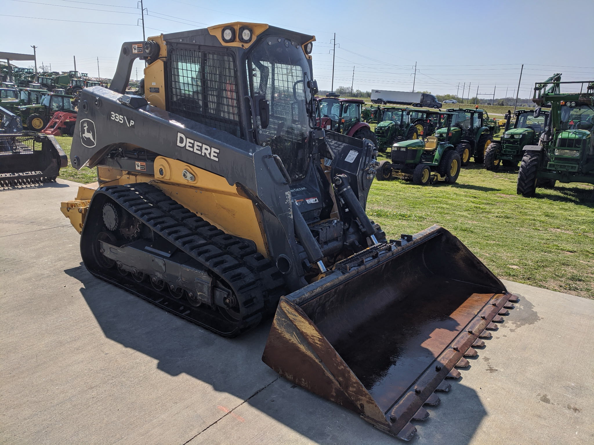  2025 John Deere 335 P at Heritage Tractor in Rogersville, MO