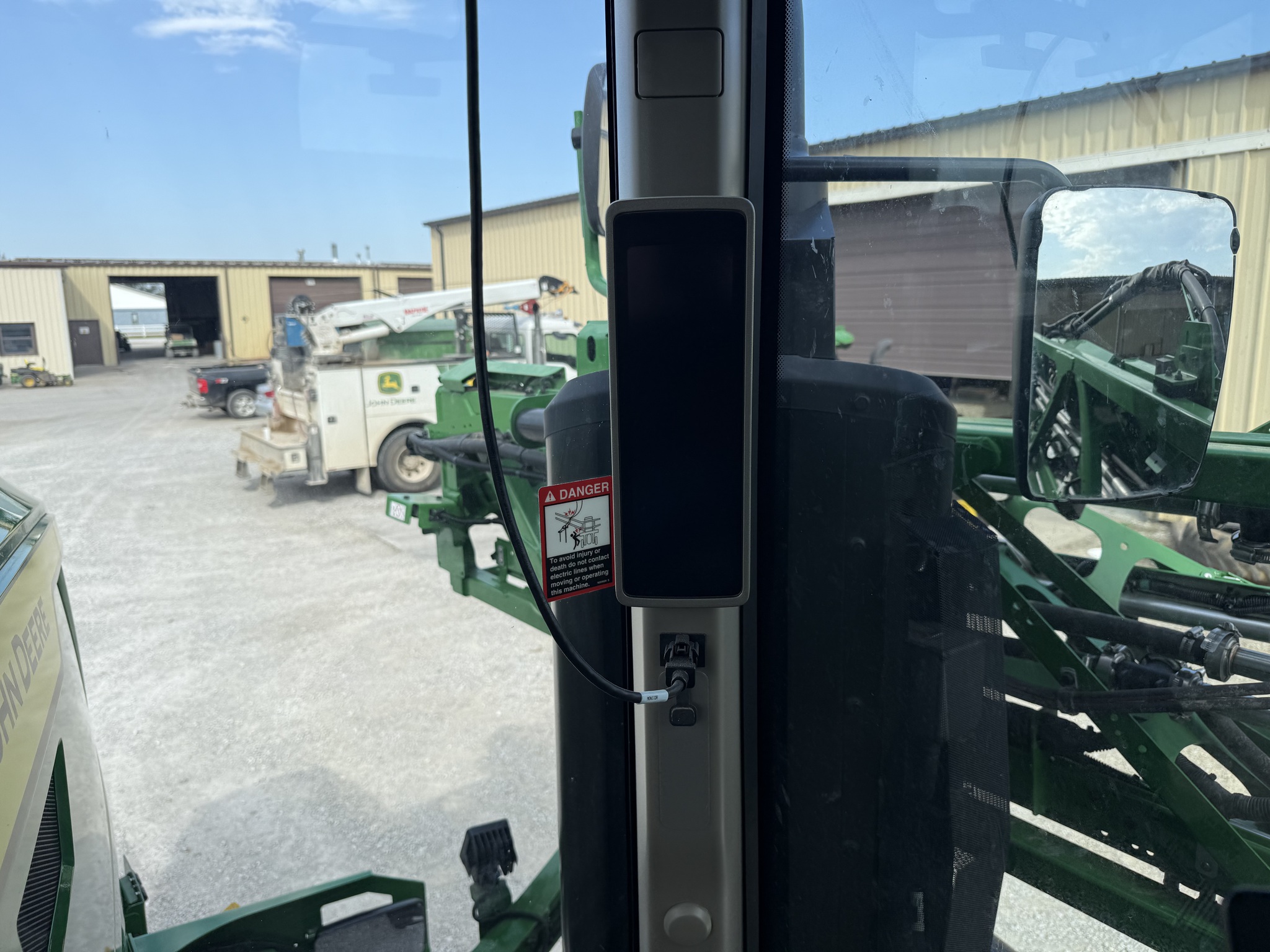  2025 John Deere 412R at Heritage Tractor in Nevada, MO
