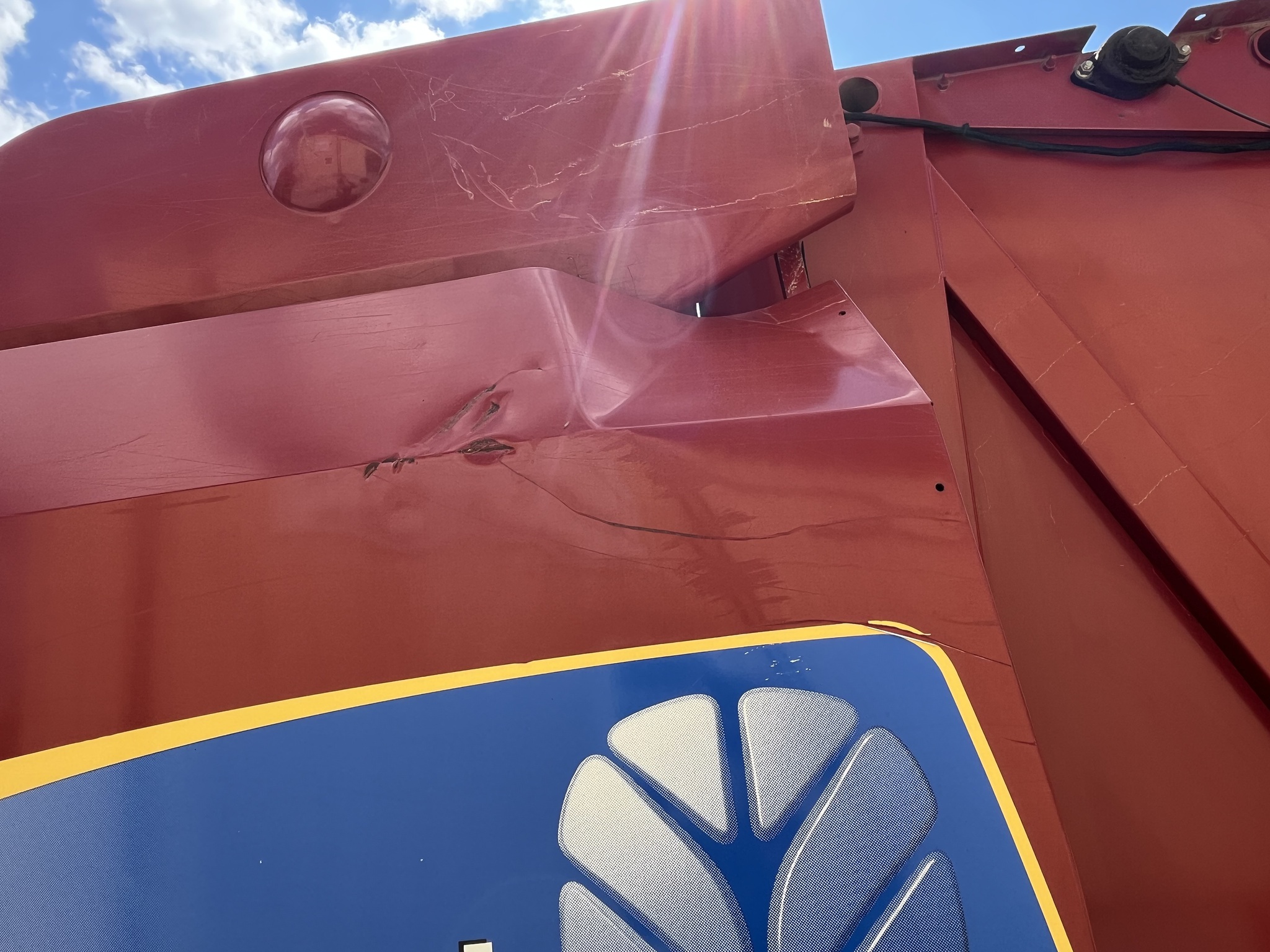  2010 New Holland BR7070 at Heritage Tractor in Nevada, MO