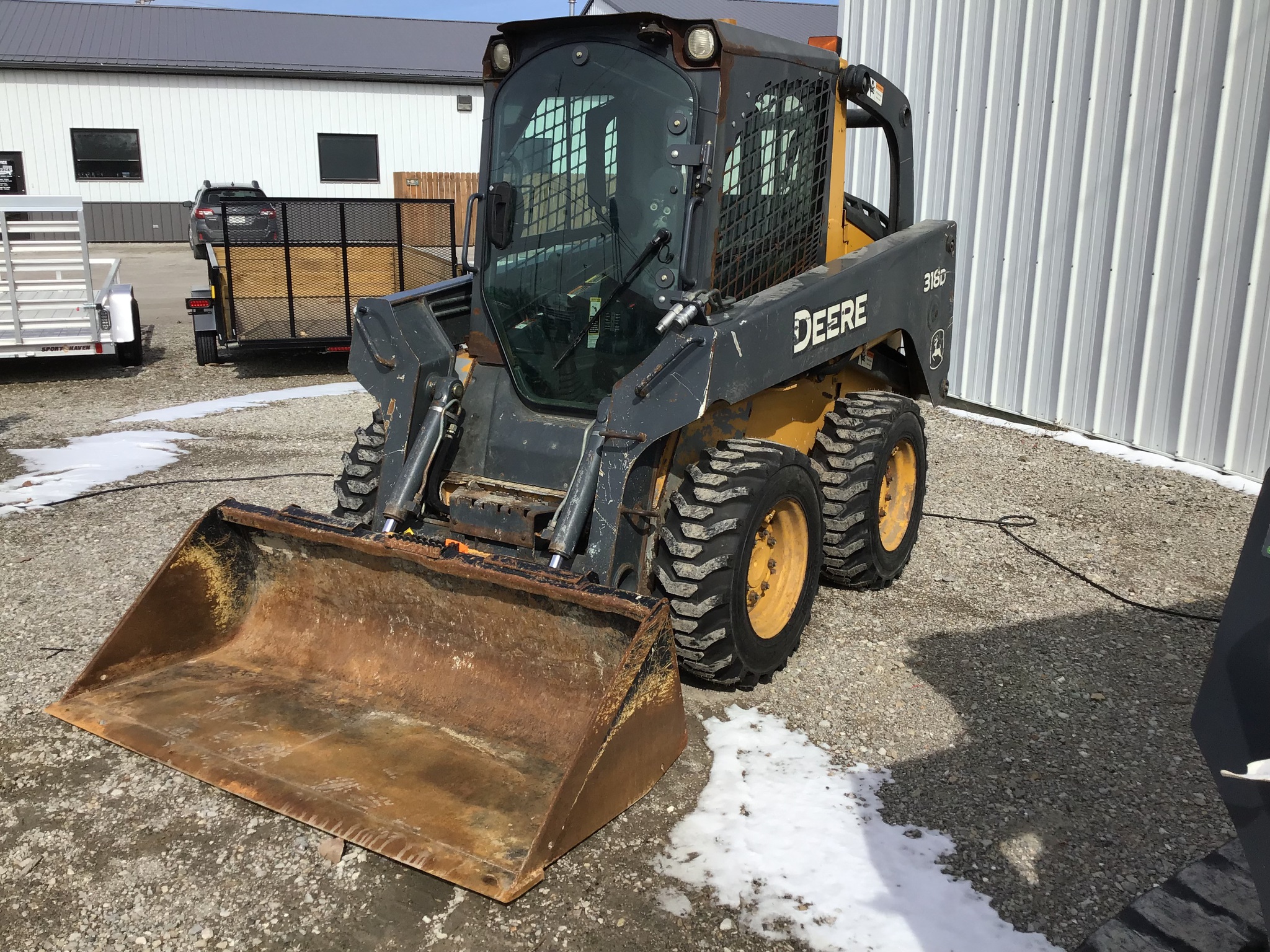 2013 John Deere 318D Image 1