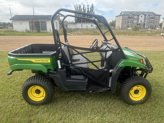 Used 2023 John Deere XUV 560E ATVs & Gators at Horizon Ag & Turf in Vermilion, AB - Photo2
