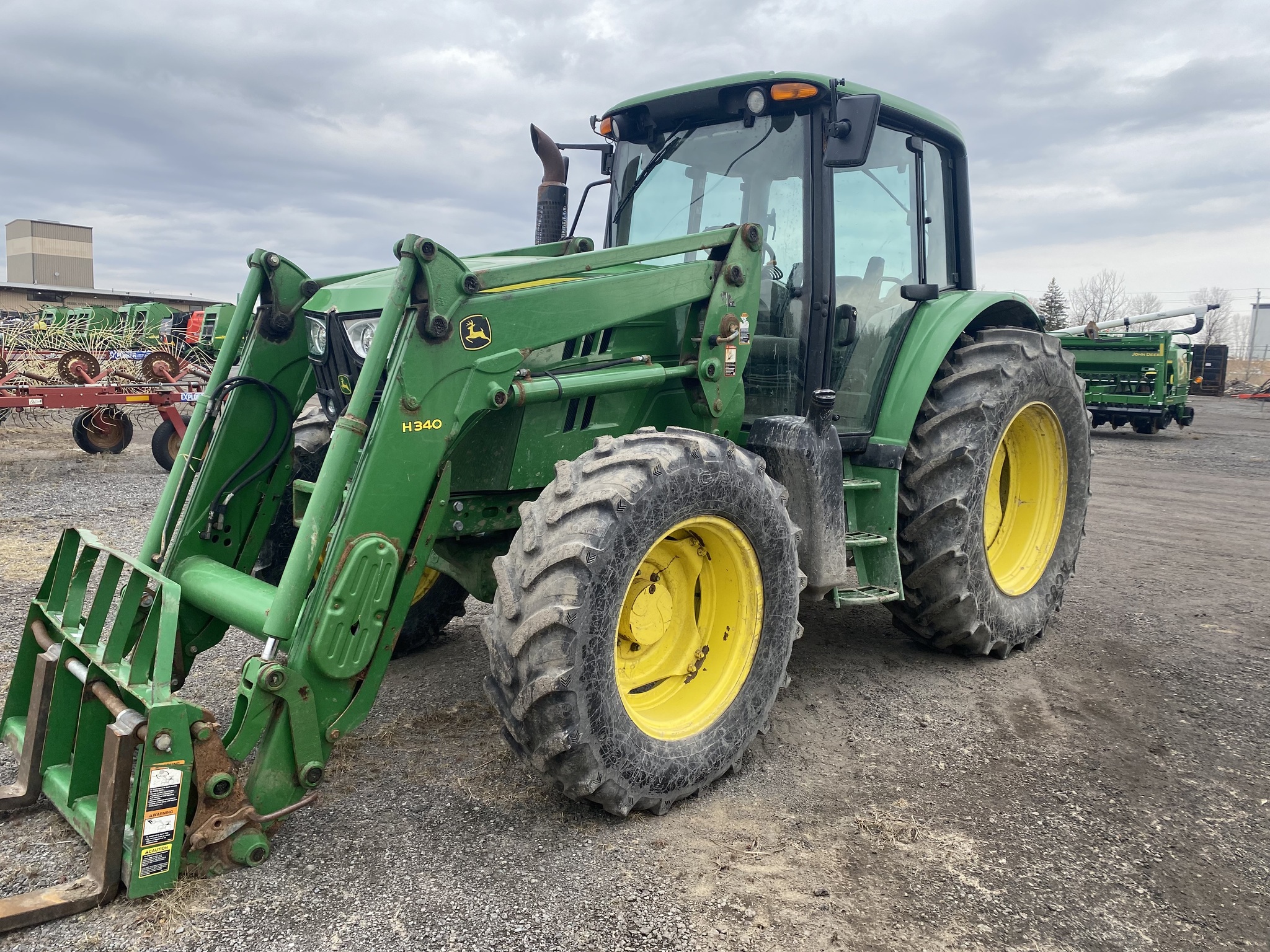 2016 John Deere 6125M Image 1