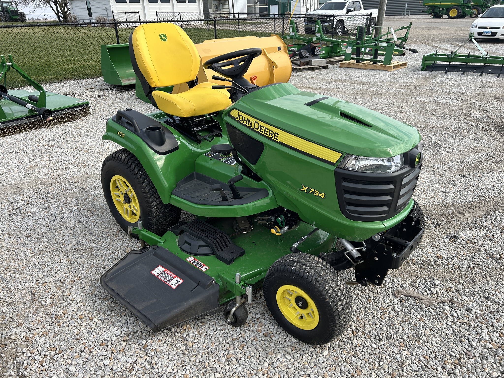  2024 John Deere X734 at Heritage Tractor in Roanoke, IL