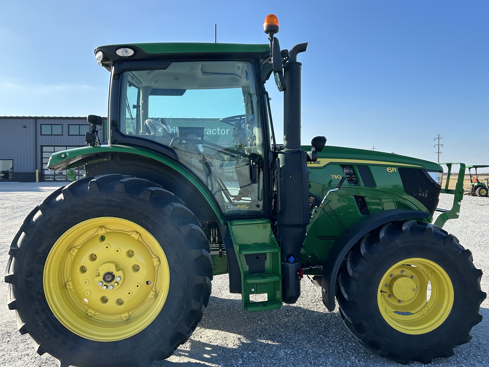  2025 John Deere 6R 130 at Heritage Tractor in Macomb, IL