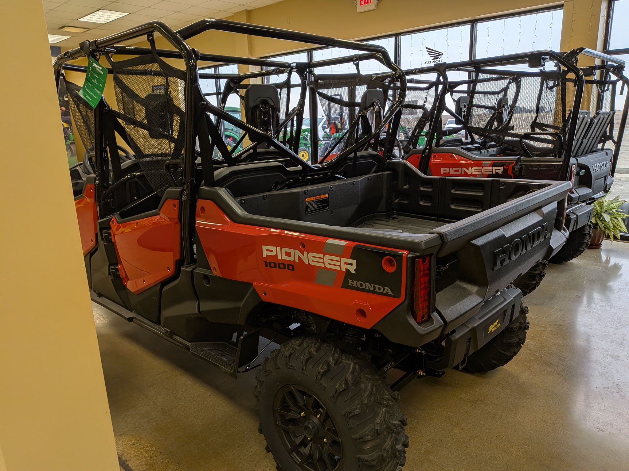  2025 Honda SXS10M6DS RED PIONEER at Heritage Tractor in Galesburg, IL