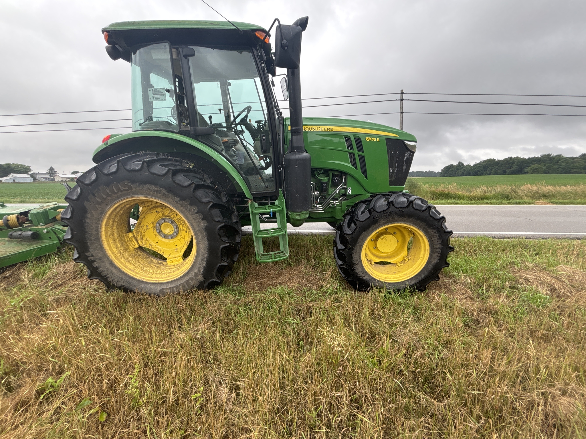 Used 2024 John Deere 6105E Cab Utility Tractors at Koenig Equipment in Greenville, OH - PhotoXL0