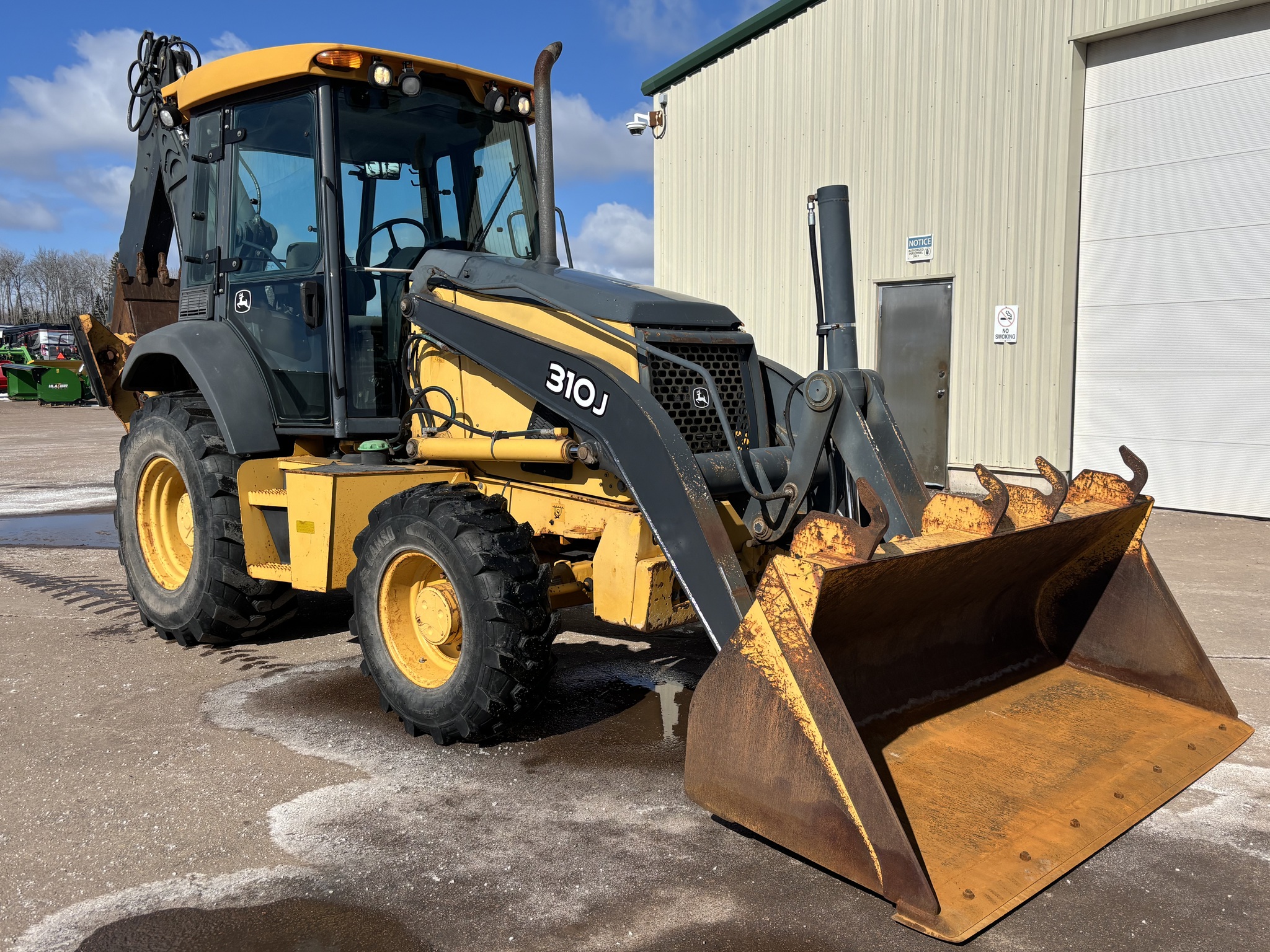 2009 John Deere 310J Image 1