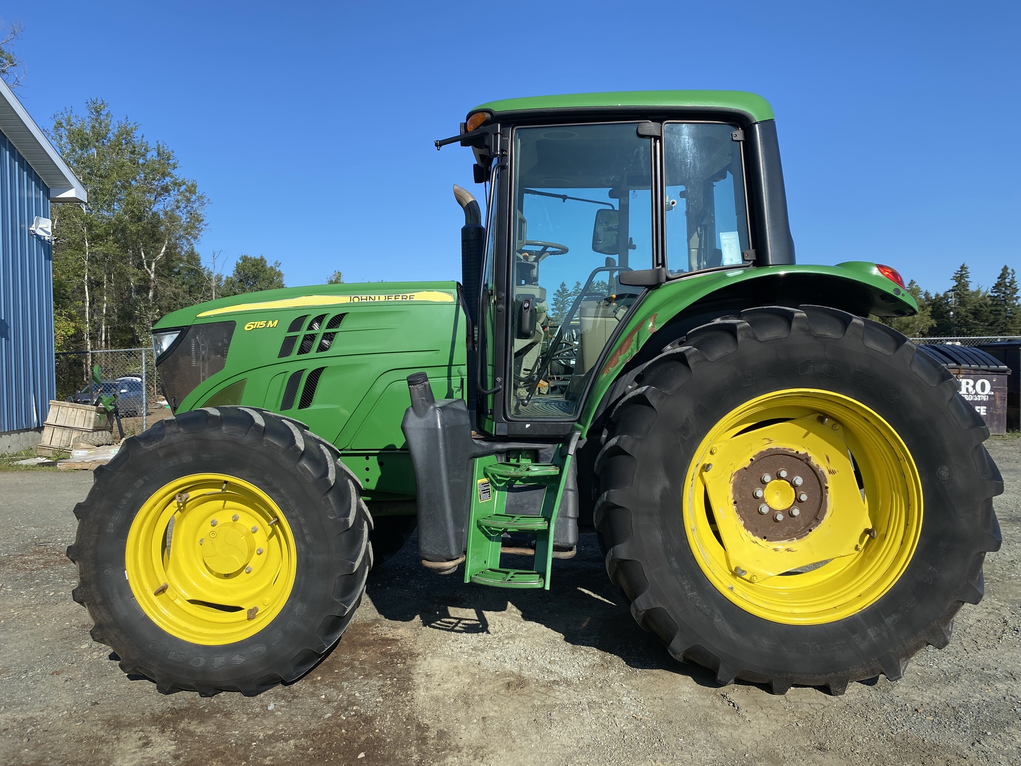 2015 John Deere 6115M Image 1