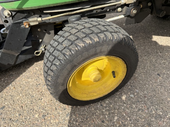 2013 John Deere X320 - Photo10