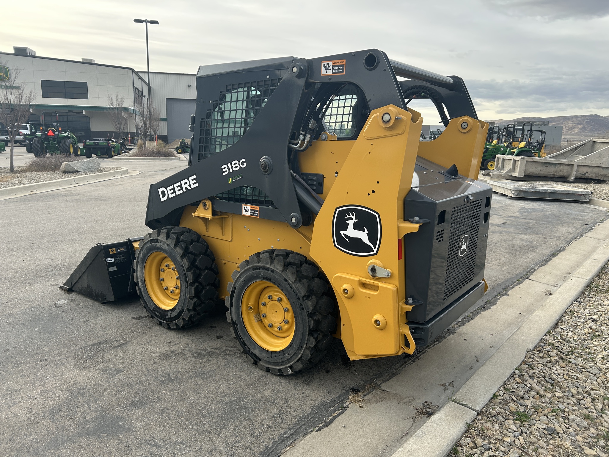 2024 John Deere 318G Image 8