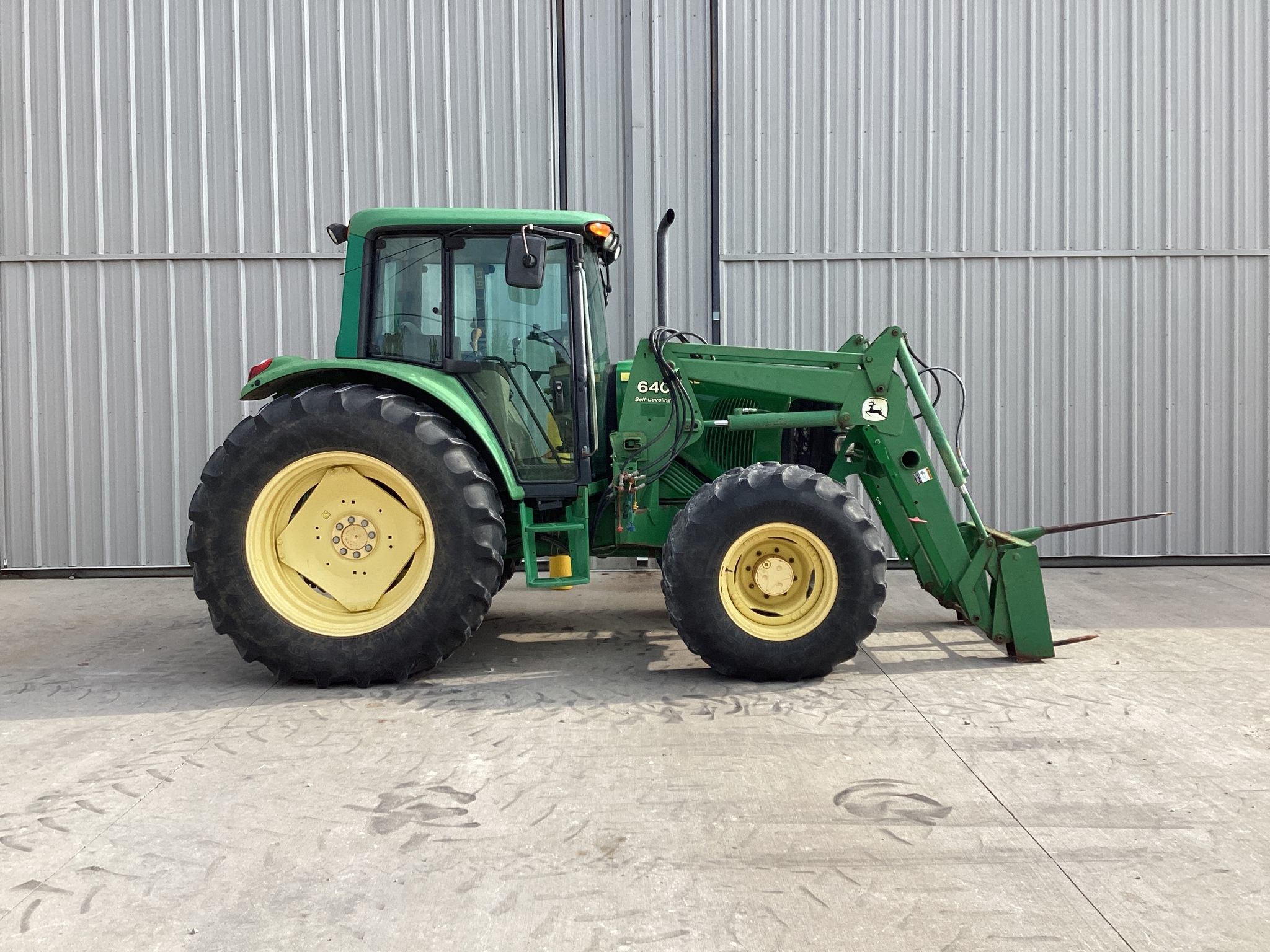 2002 John Deere 6320 Image 2