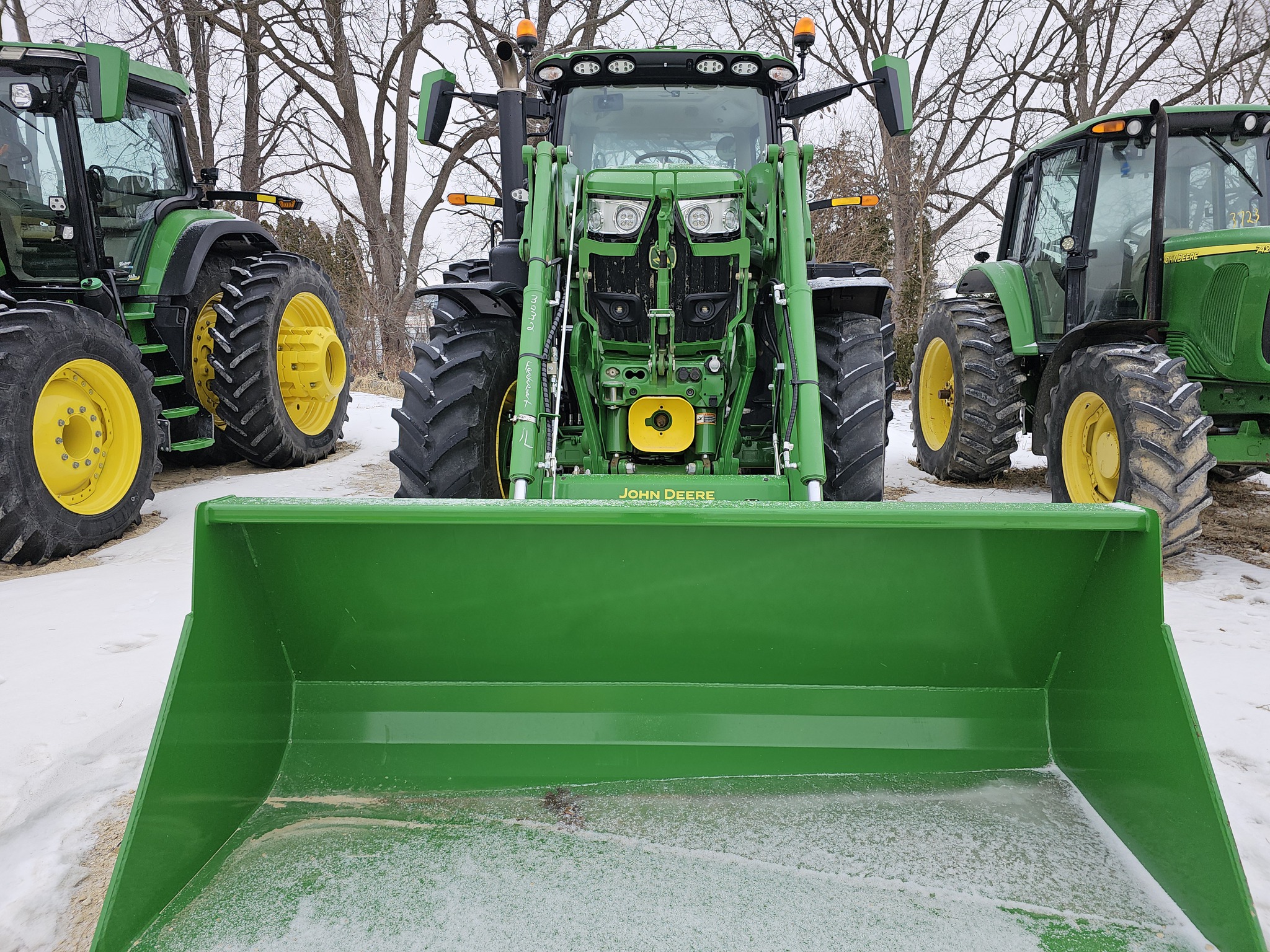  2024 John Deere 6R 215 at Heritage Tractor in Freeport, IL