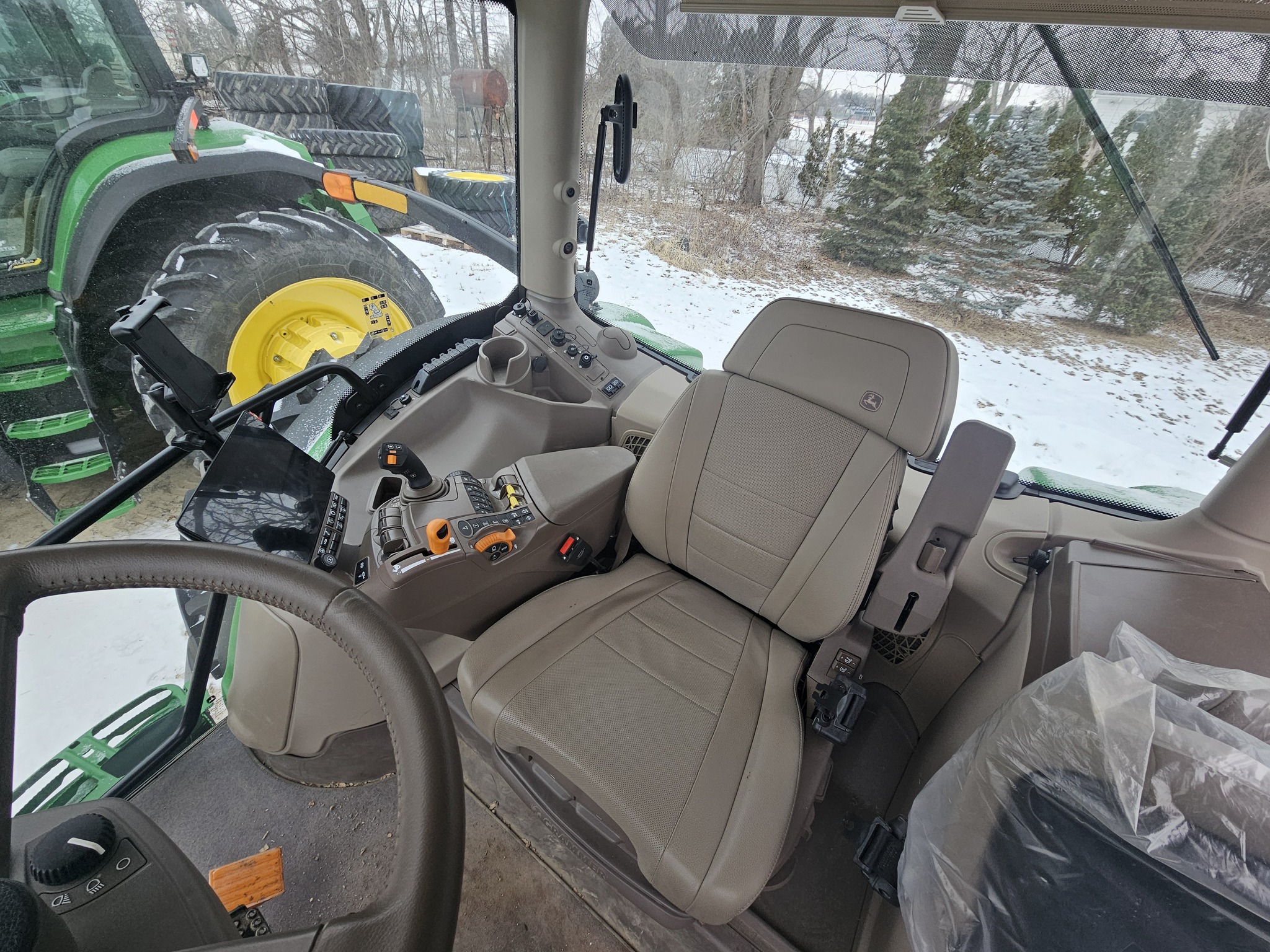  2024 John Deere 6R 215 at Heritage Tractor in Freeport, IL