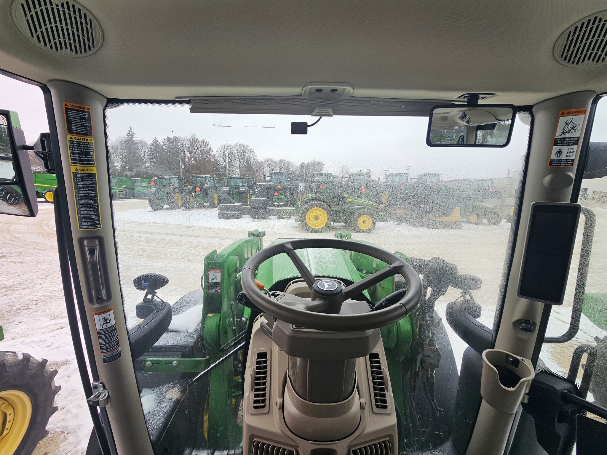  2024 John Deere 6R 215 at Heritage Tractor in Freeport, IL