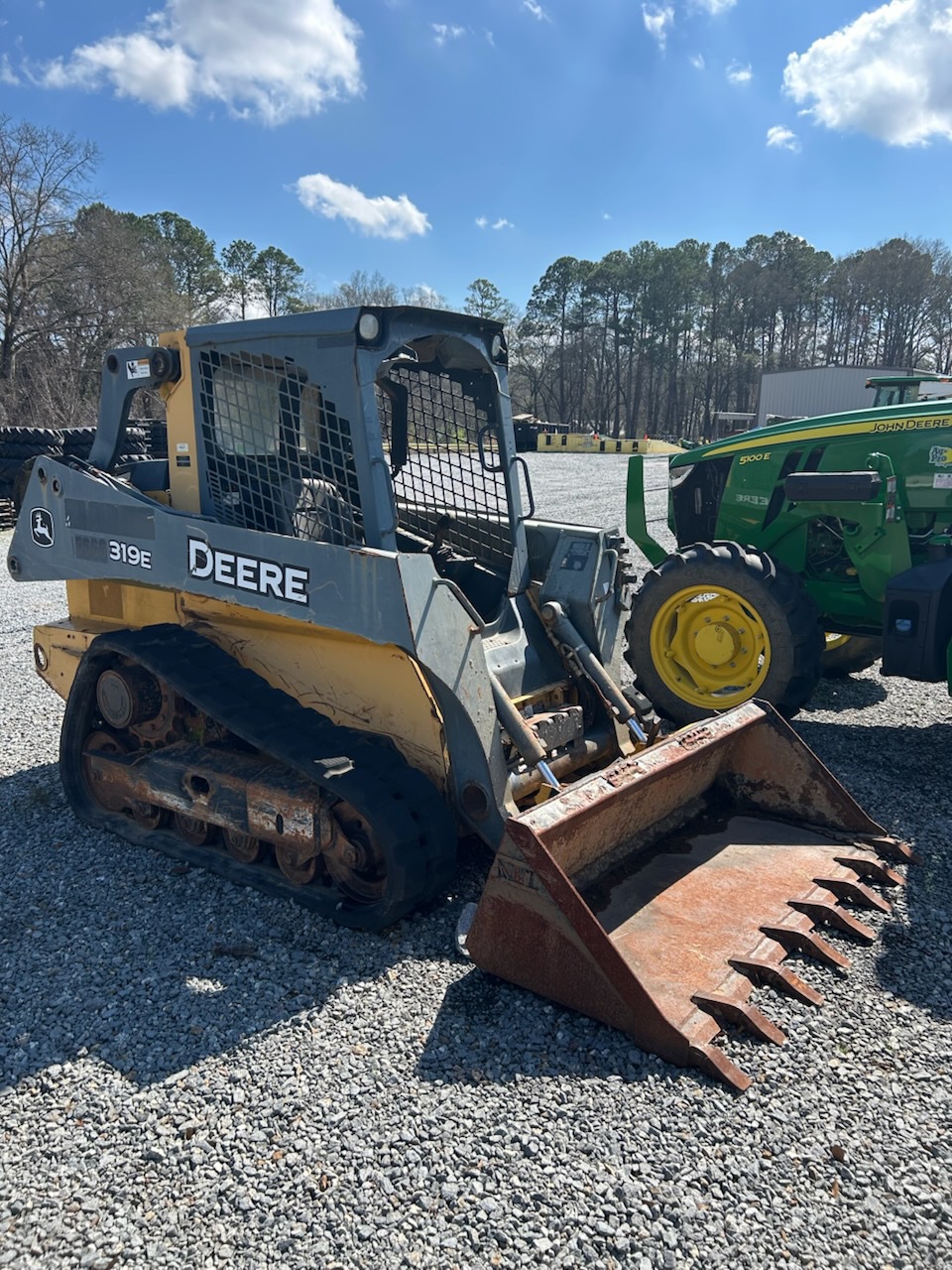 2014 John Deere 319E Image 1