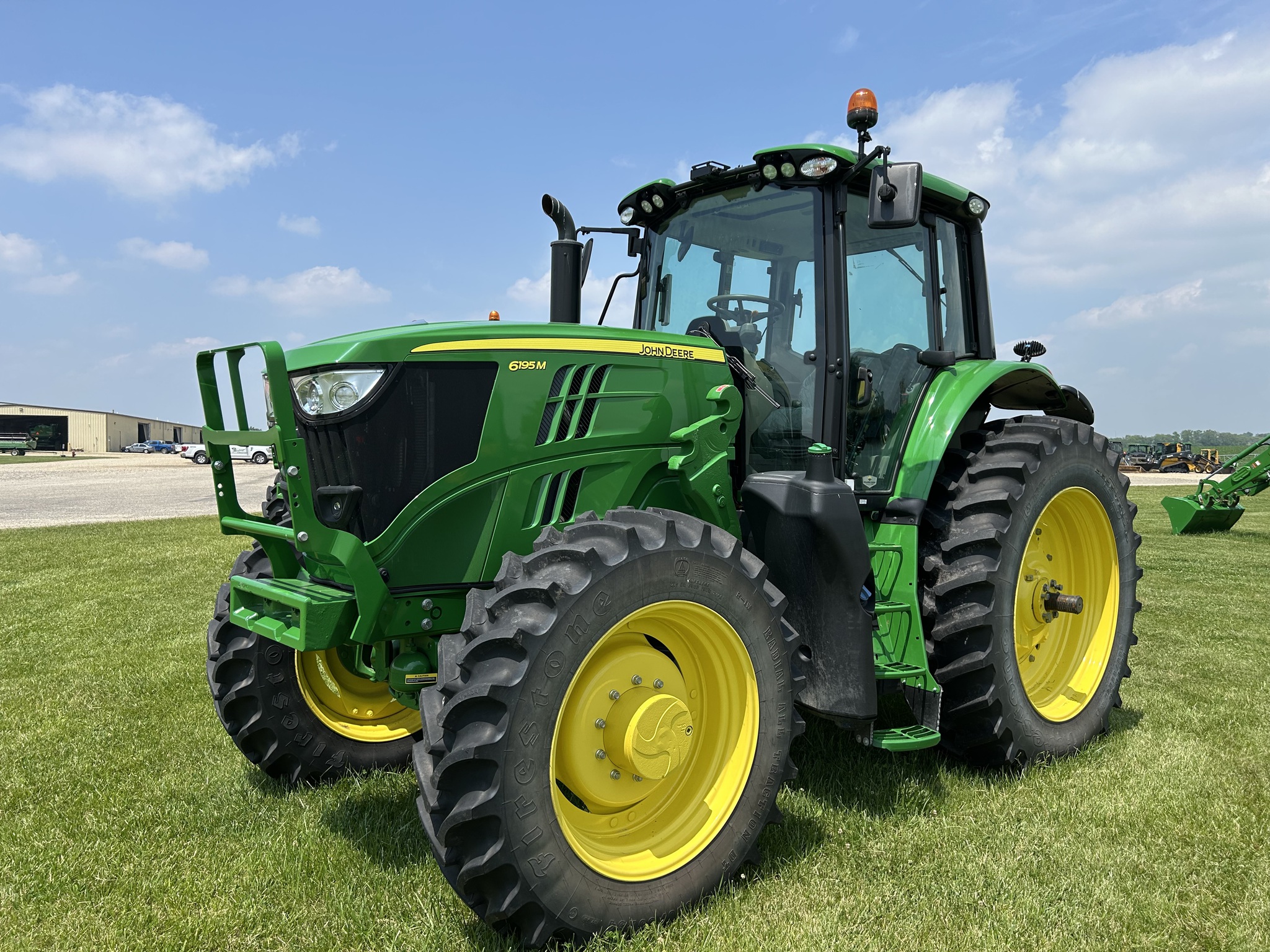 2023 John Deere 6195M at Heritage Tractor in Lacon, IL
