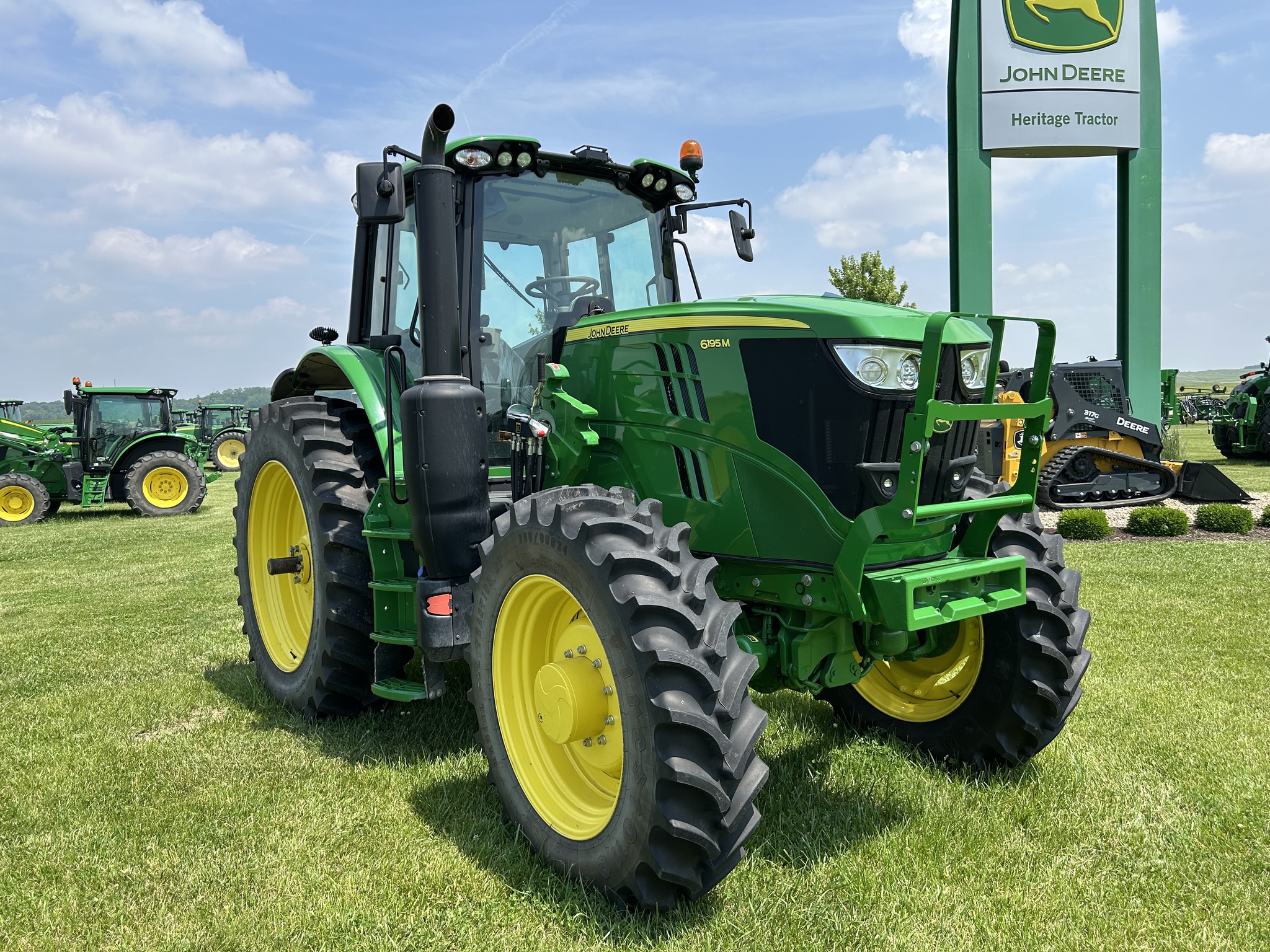  2023 John Deere 6195M at Heritage Tractor in Lacon, IL