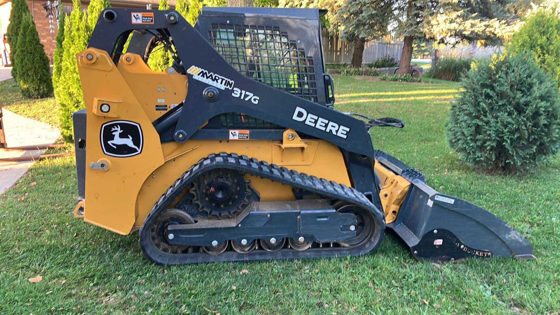 2021 John Deere 317G Image 1