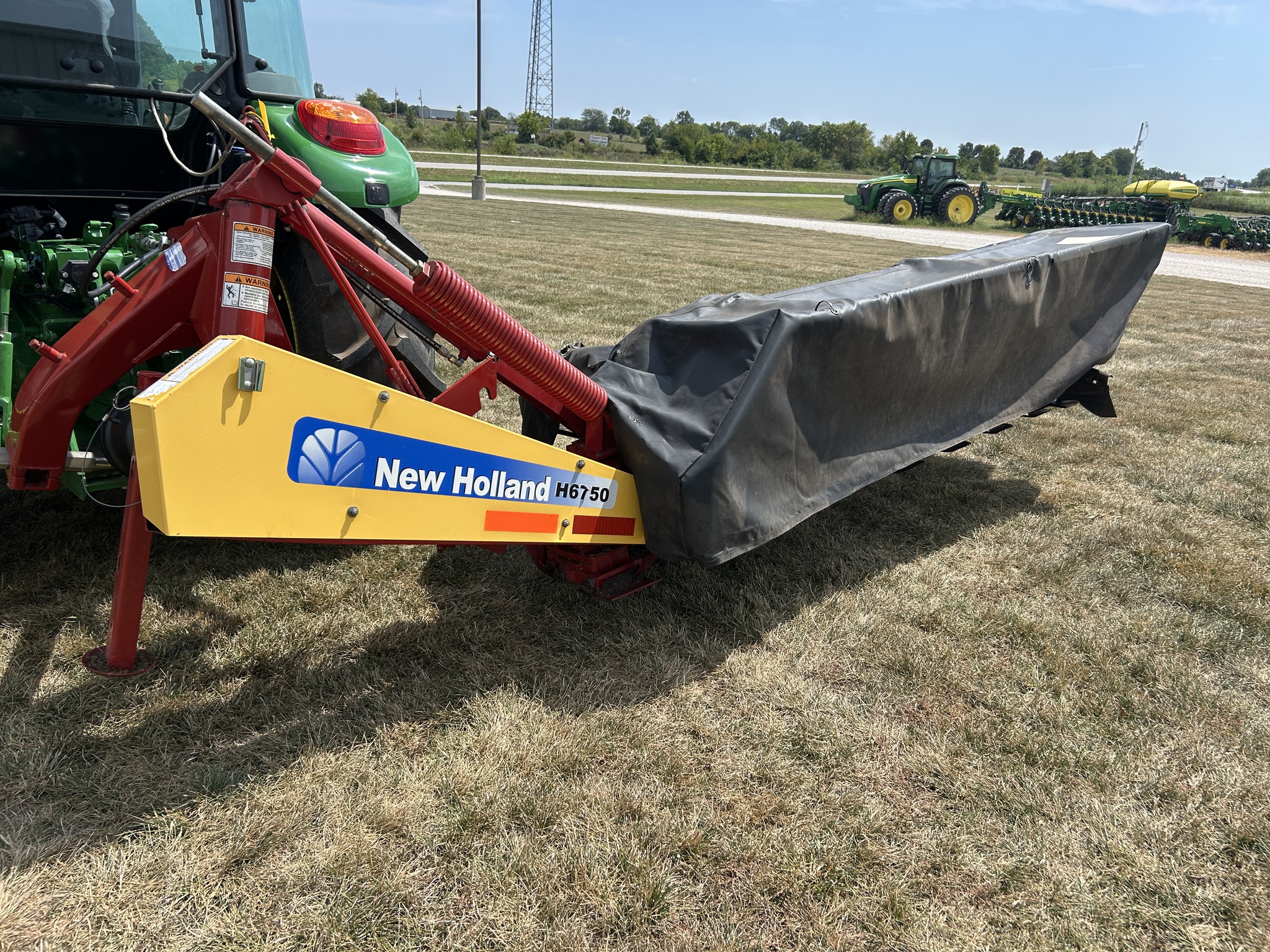  2013 New Holland H6750 at Heritage Tractor in Adrian, MO