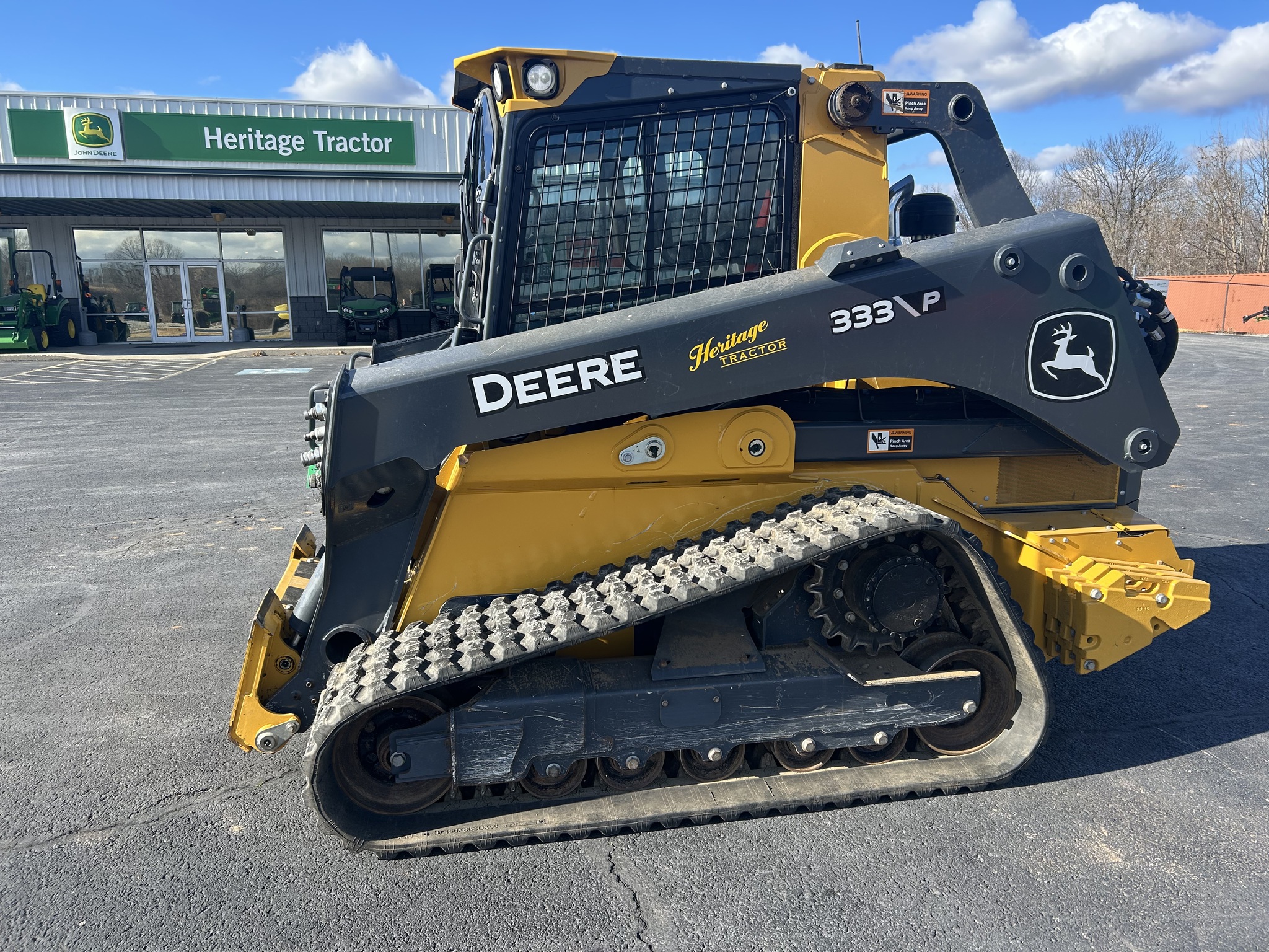  2025 John Deere 333 P at Heritage Tractor in Anderson, MO