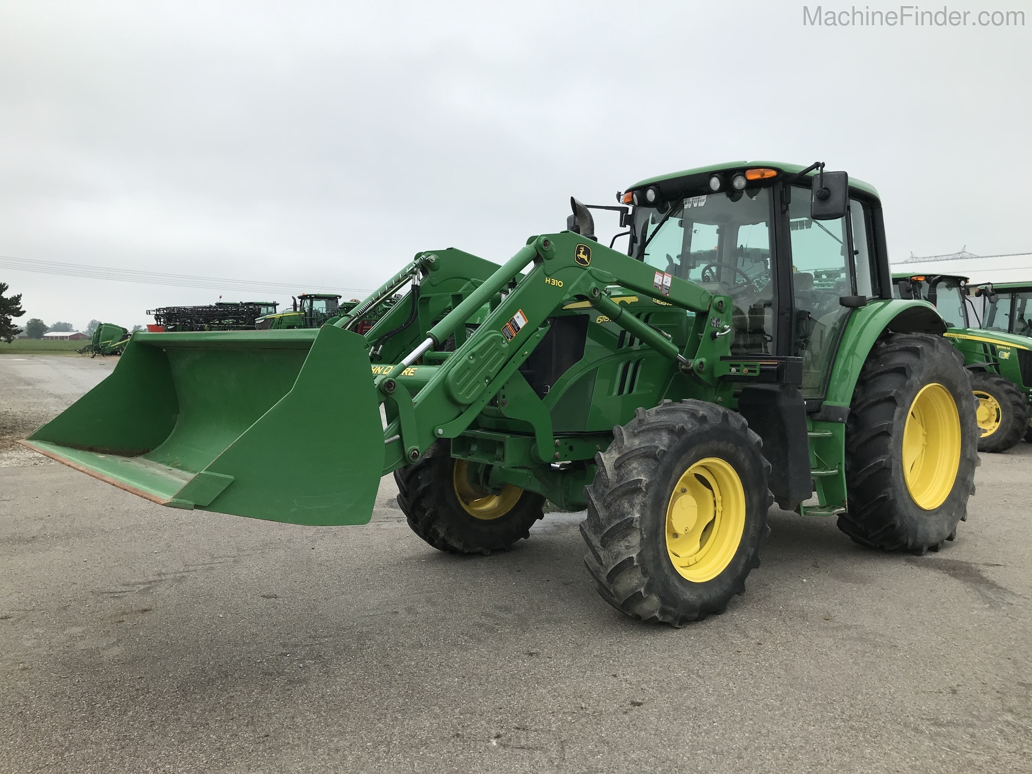 2015 John Deere 6115M Image 1