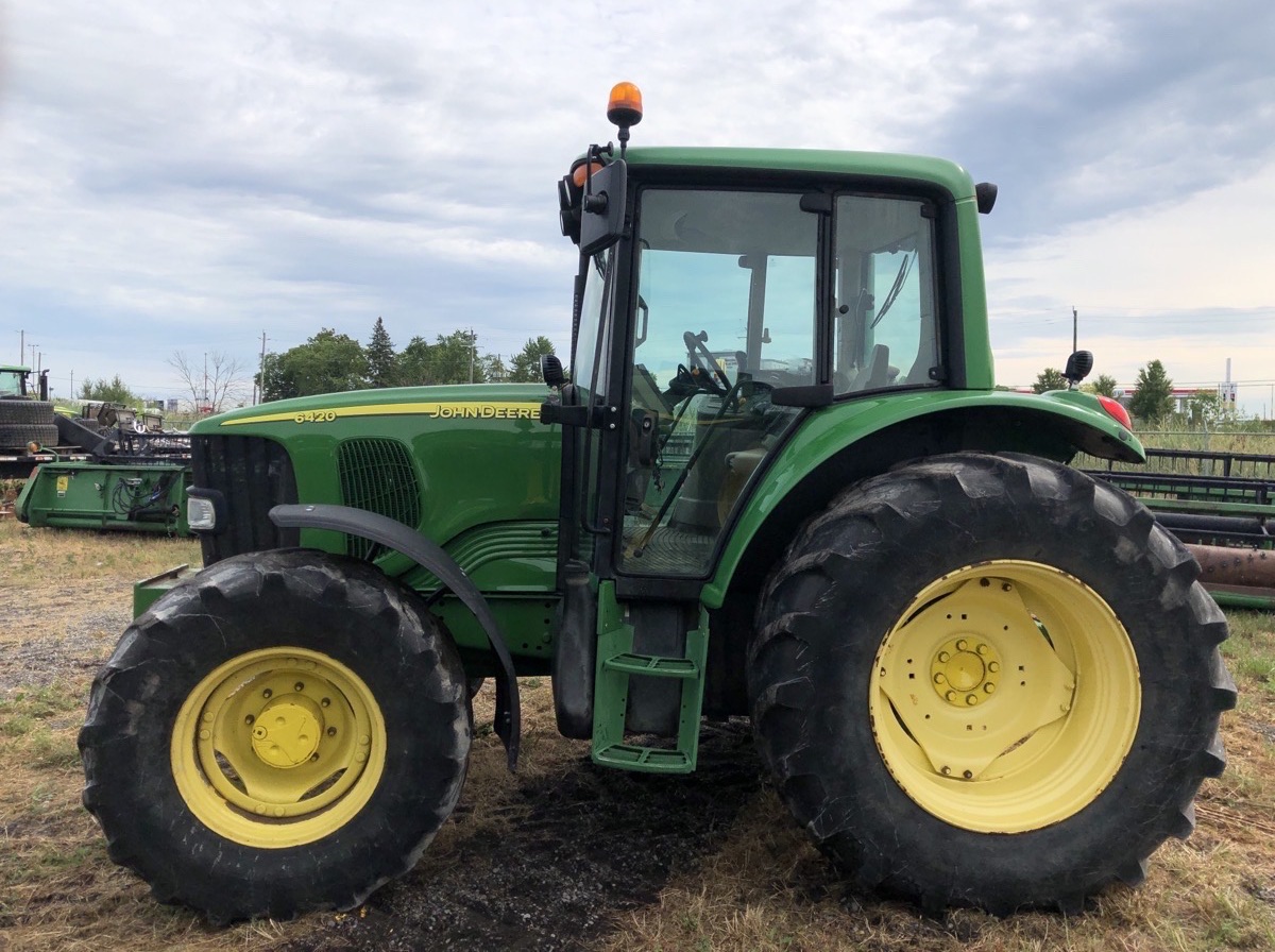 2002 John Deere 6420 Image 1