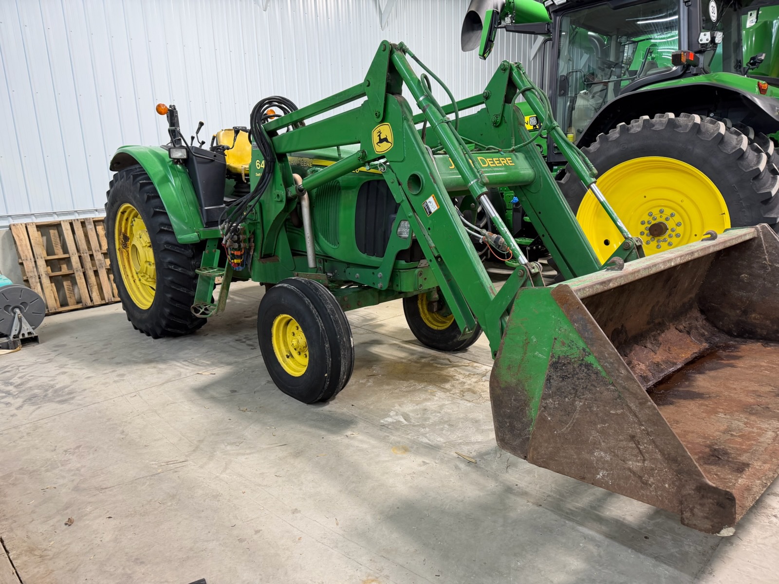 2002 John Deere 6320 Image 1