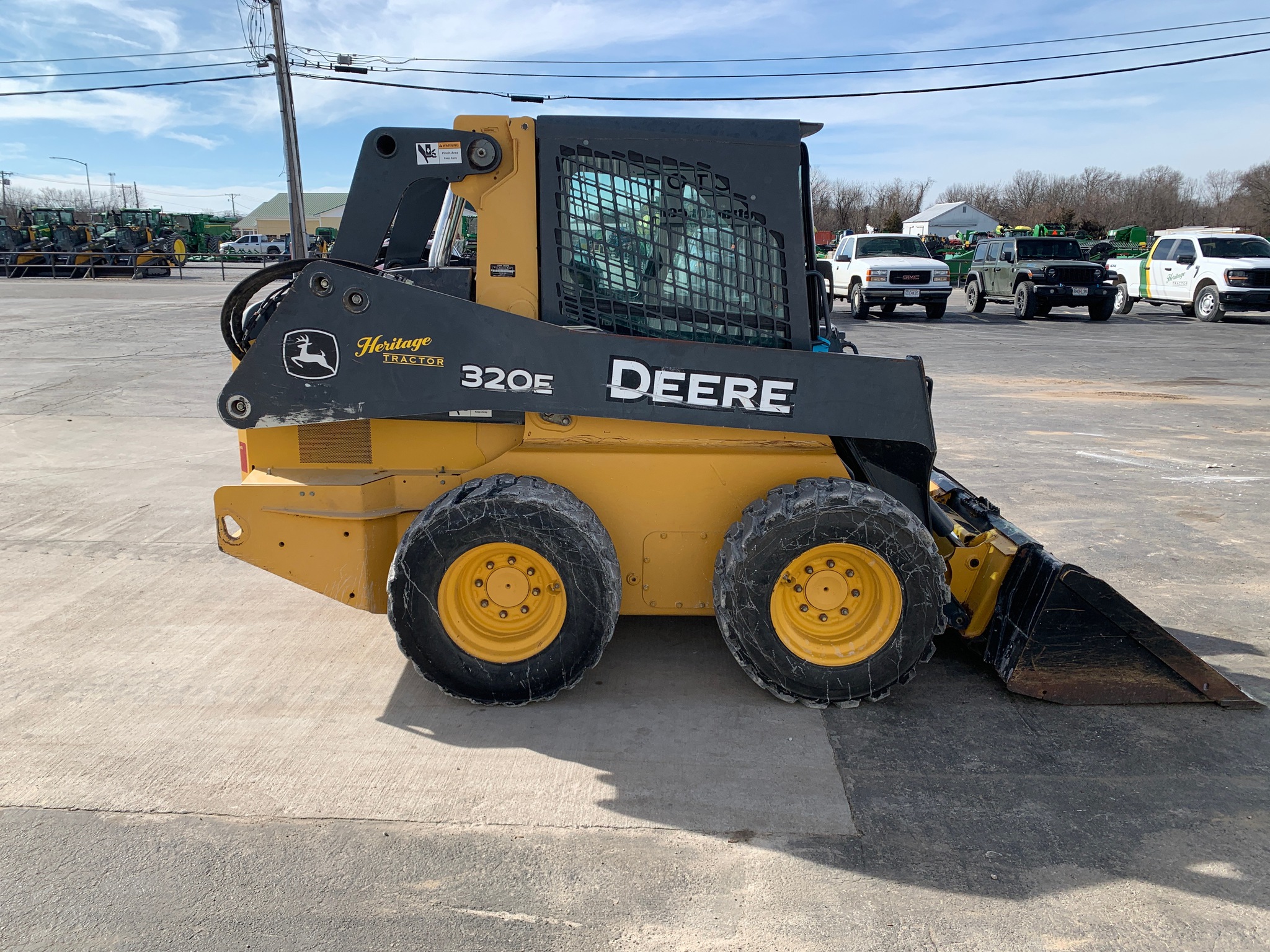  2014 John Deere 320E at Heritage Tractor in Lamar, MO