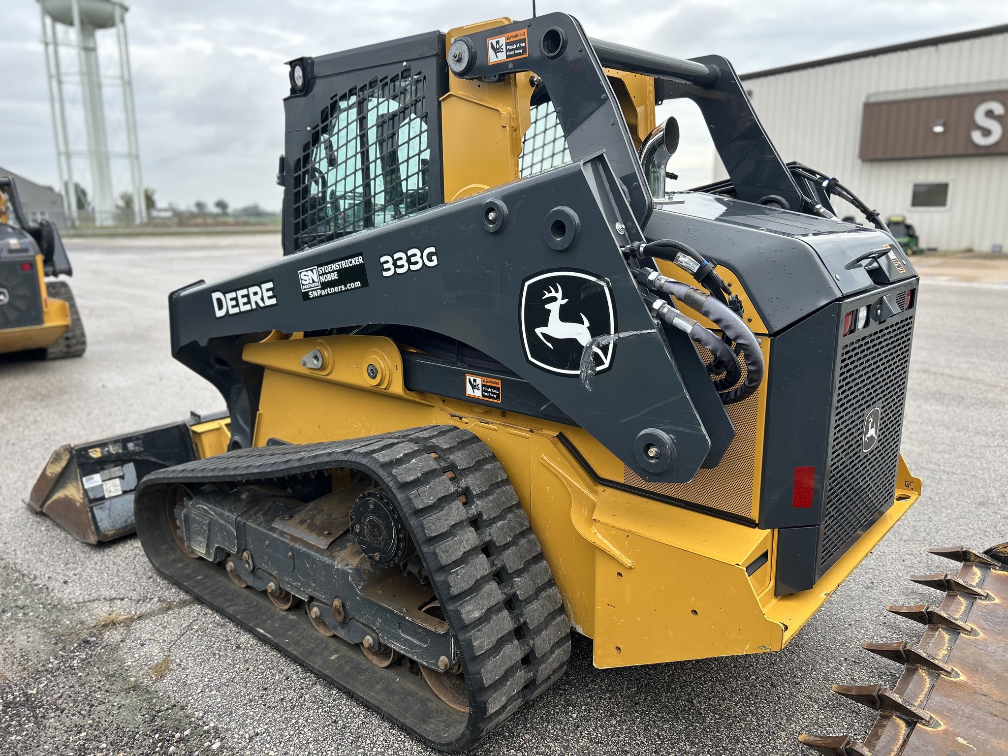 2023 John Deere 333G - Sydenstricker Nobbe Partners