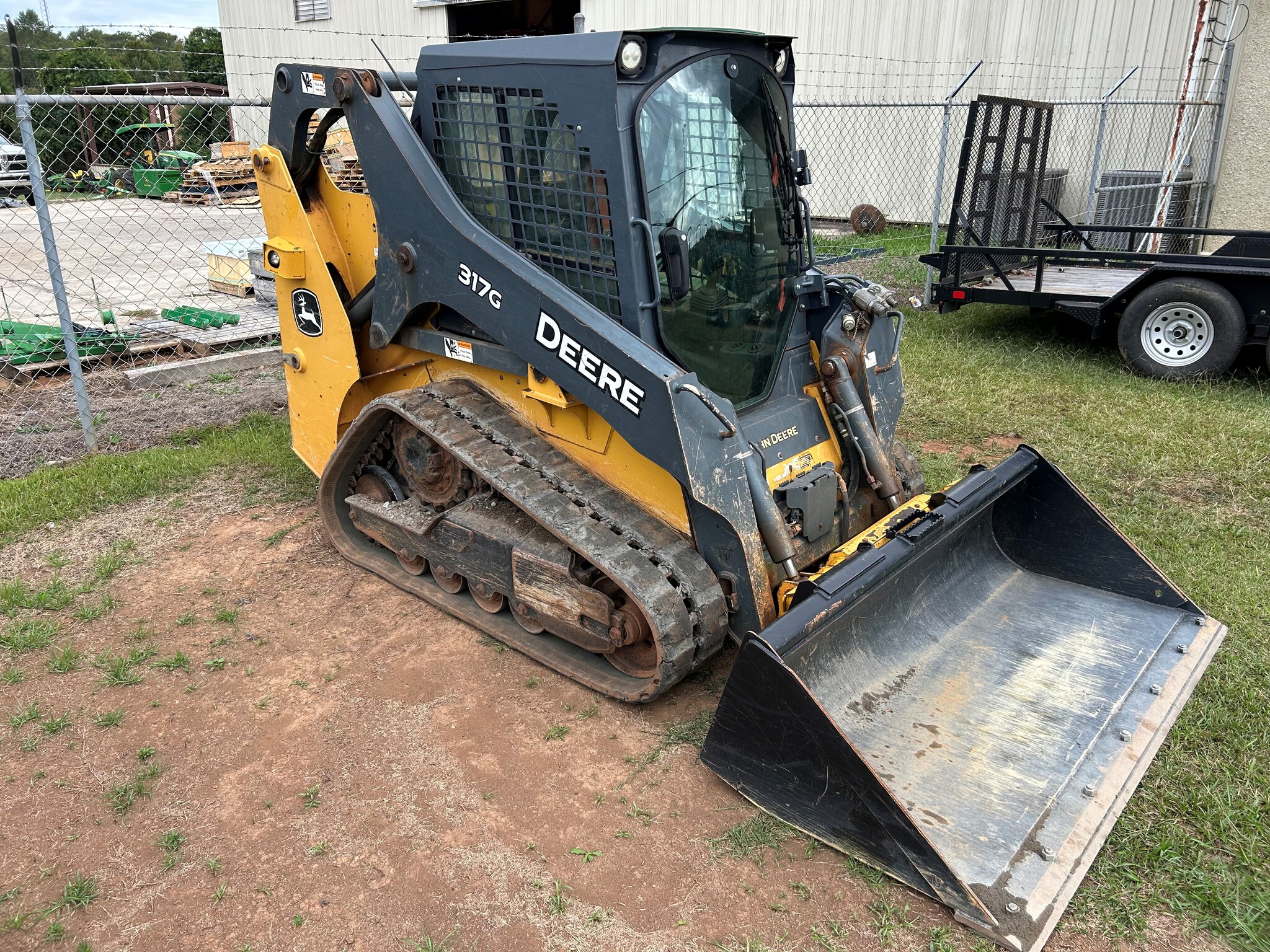 2016 John Deere 317G Image 1