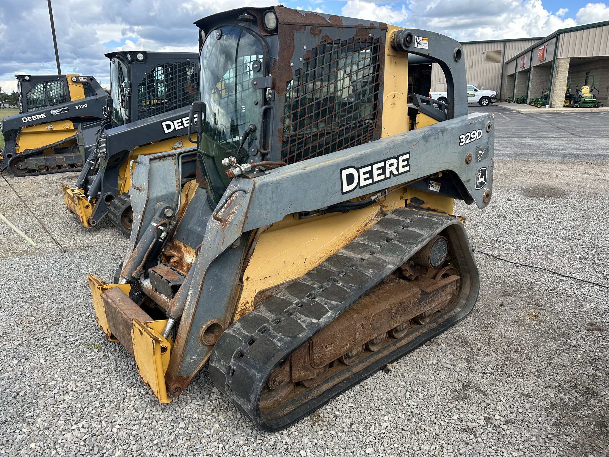 2011 John Deere 329D Image 1